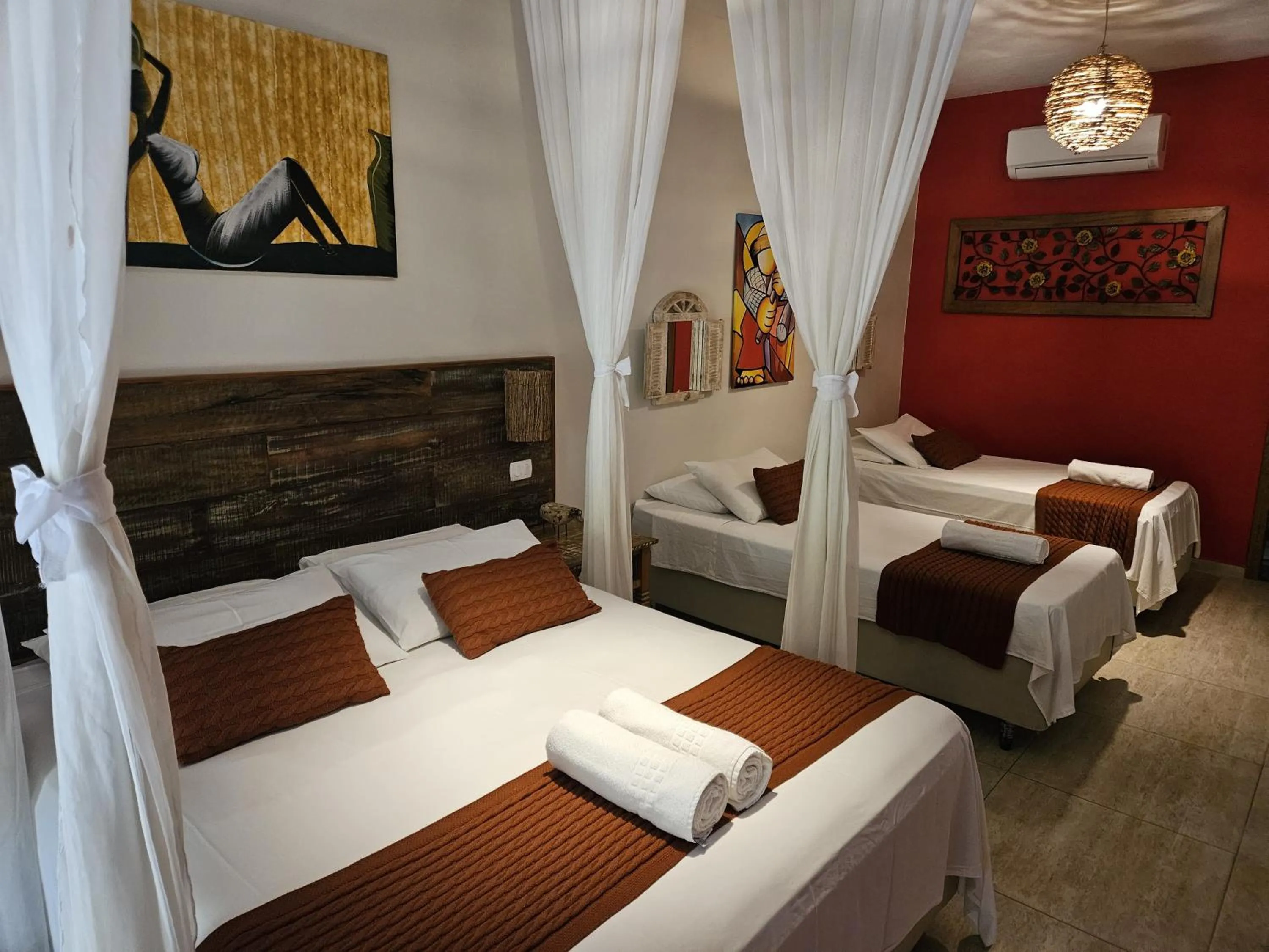 Bed in Pousada de Charme Emirados