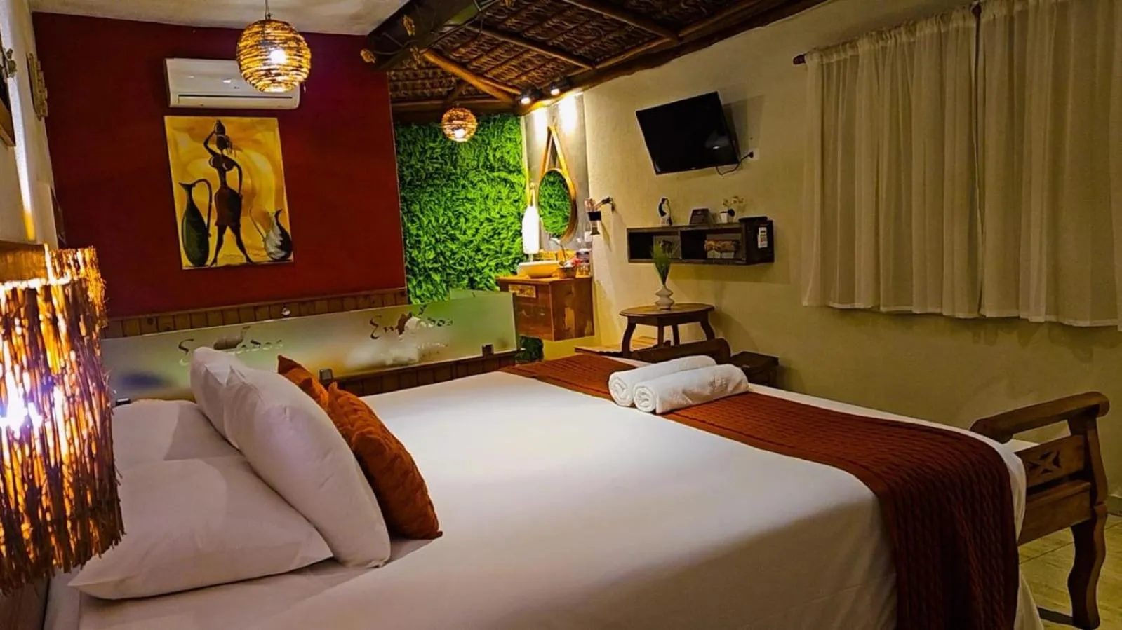 Bed in Pousada de Charme Emirados