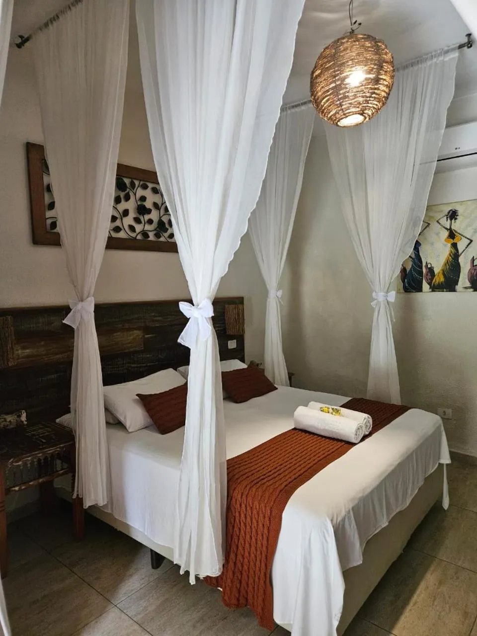 Bed in Pousada de Charme Emirados