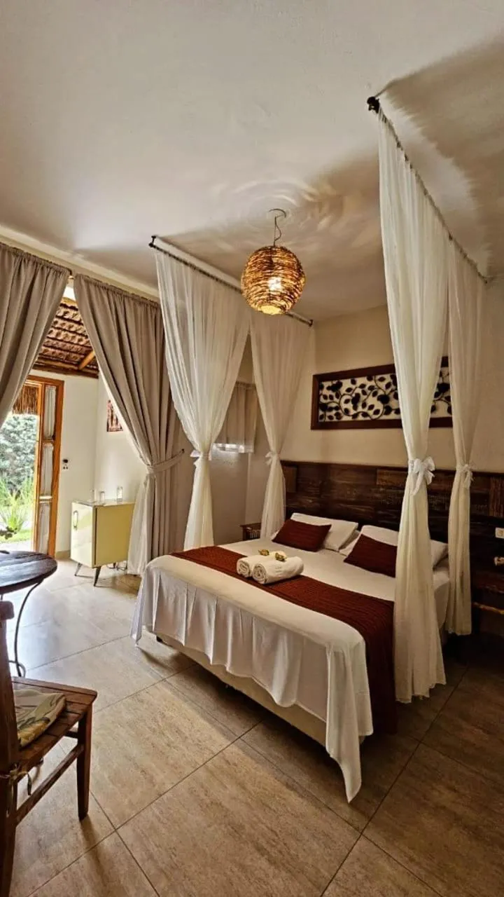 Bed in Pousada de Charme Emirados