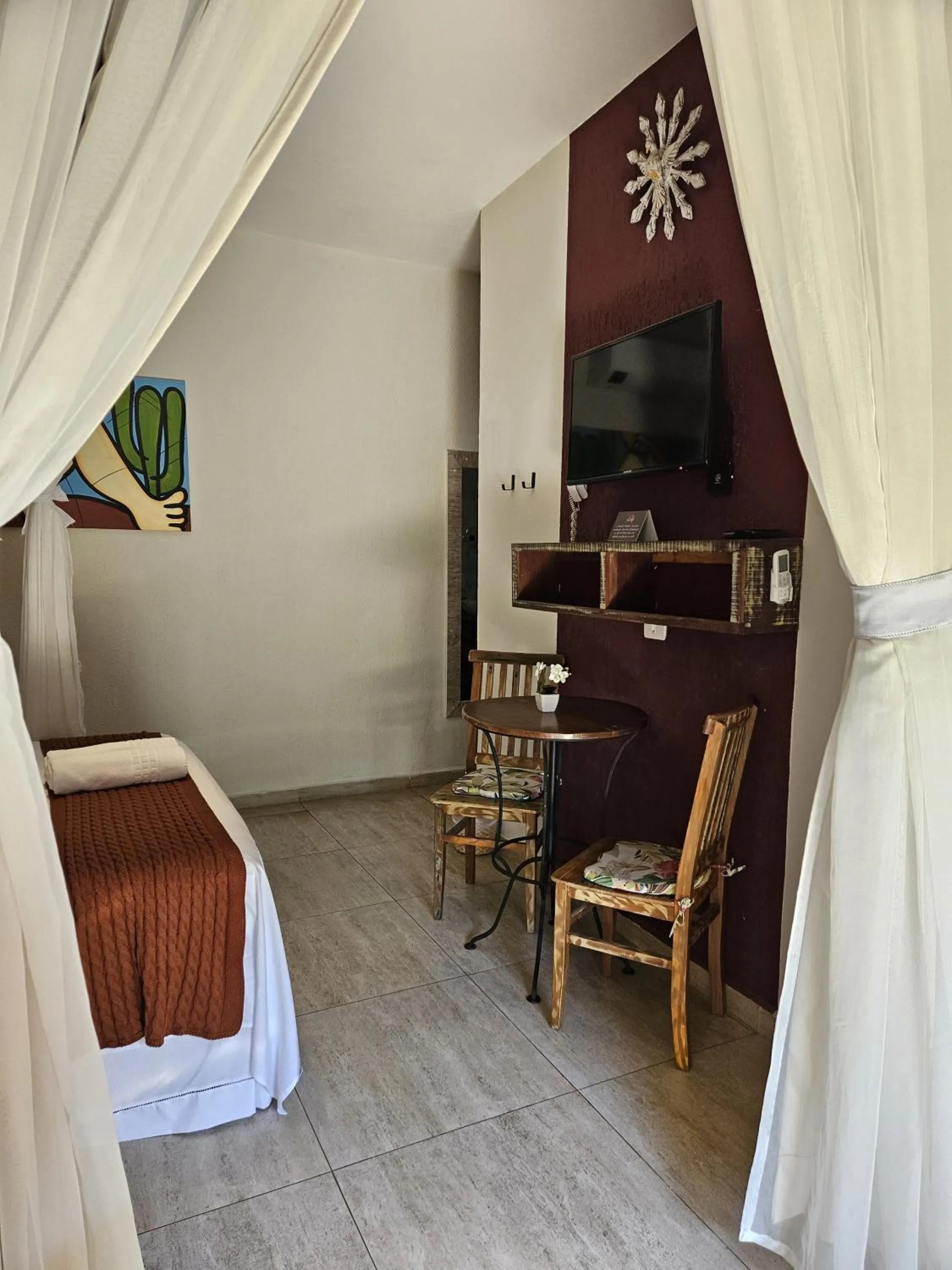 Bed in Pousada de Charme Emirados