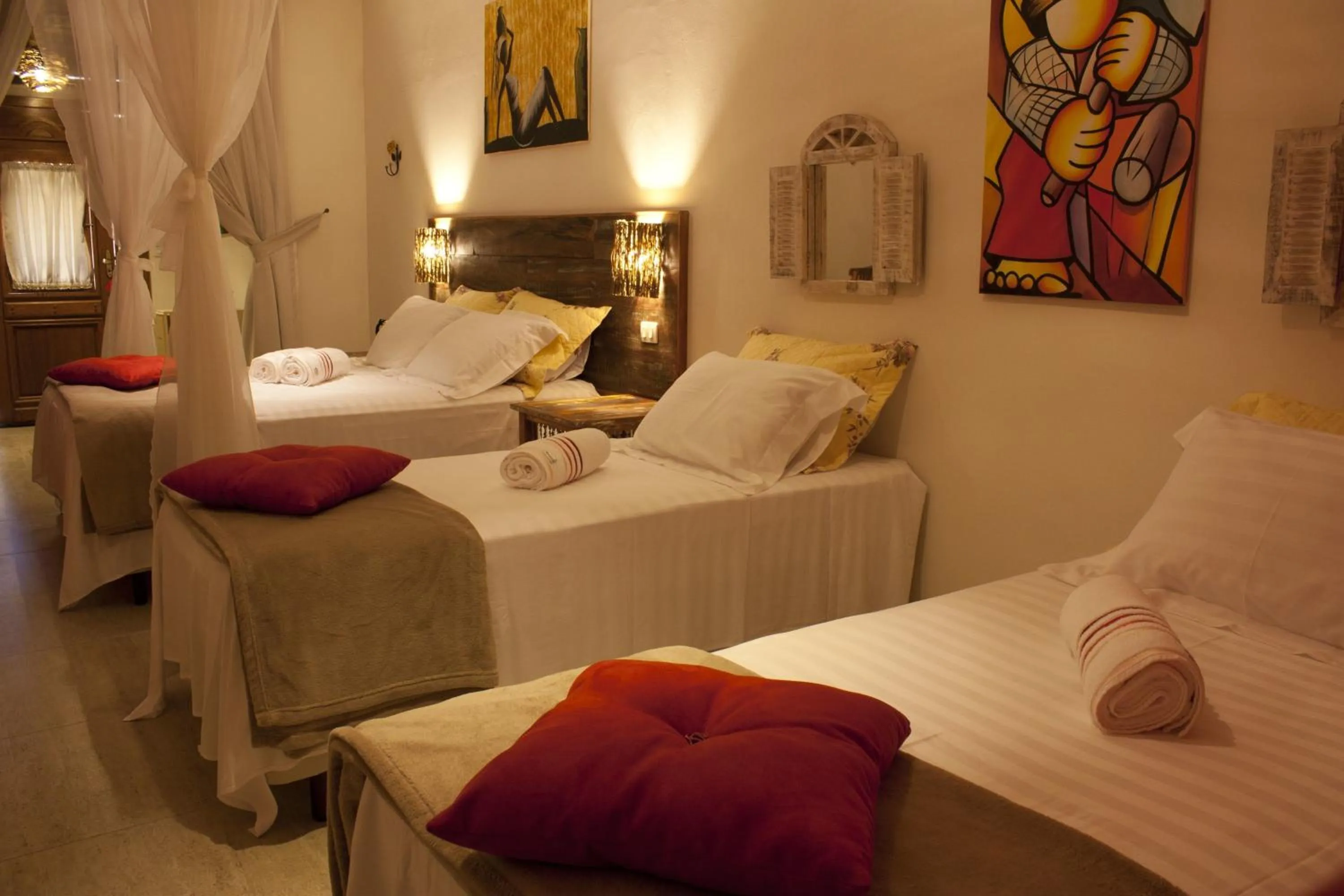 Bed in Pousada de Charme Emirados