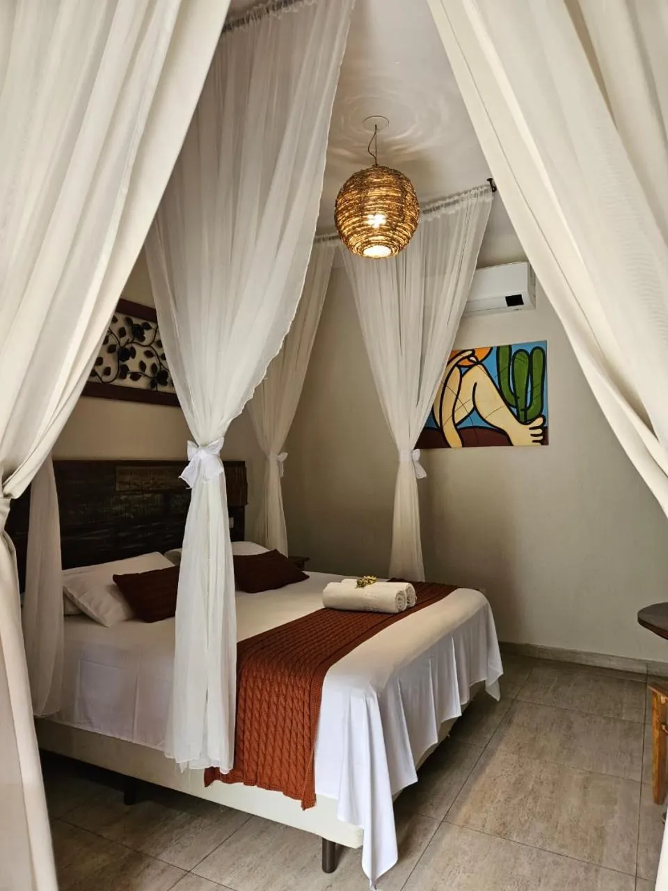 Bed in Pousada de Charme Emirados