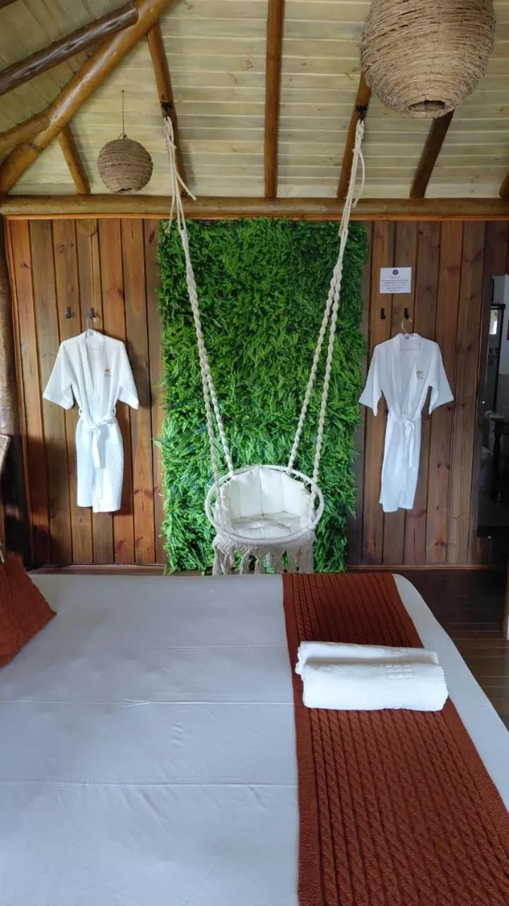 Bed in Pousada de Charme Emirados