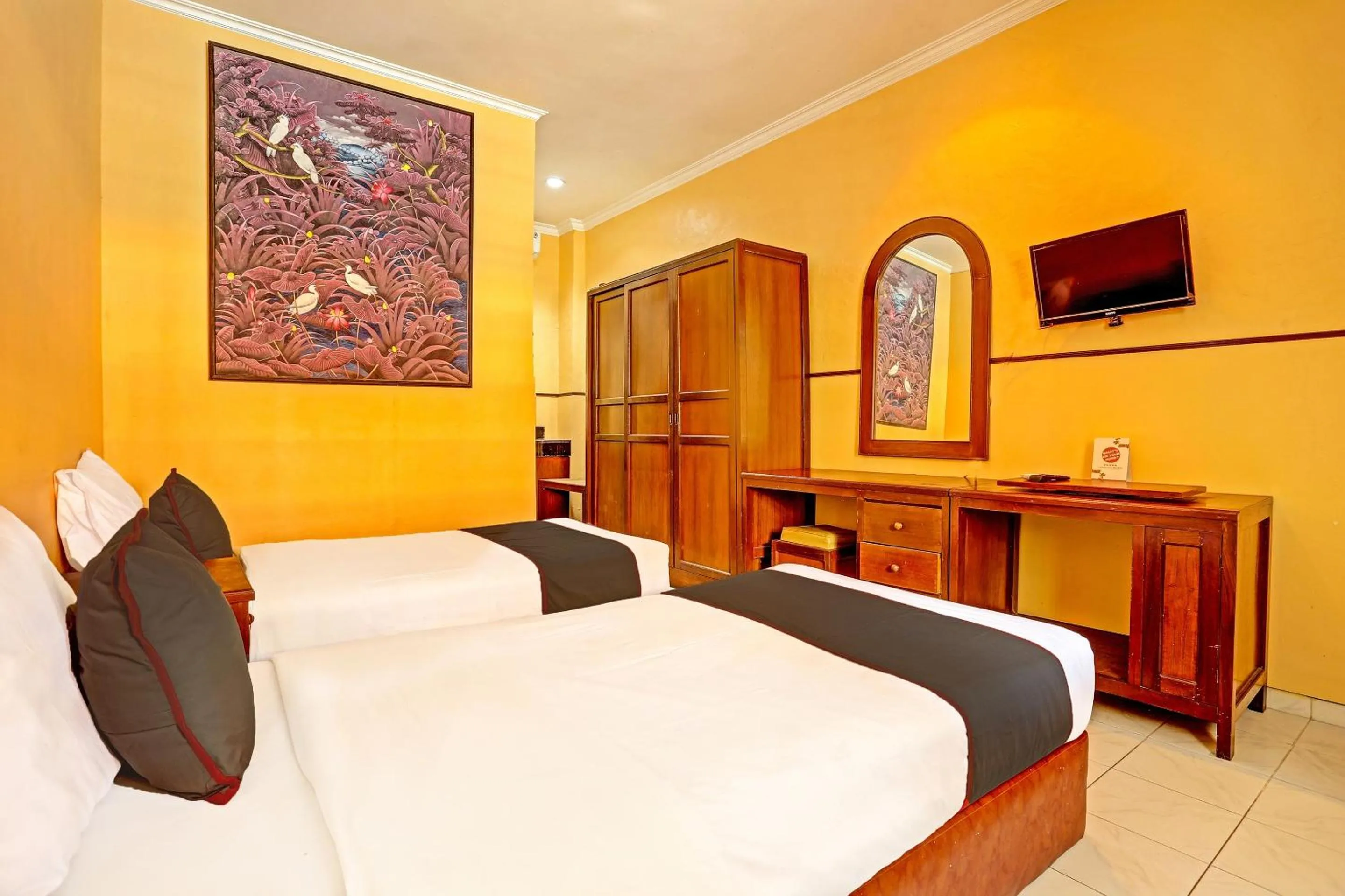 Bedroom in Collection O 91081 New Arena Hotel