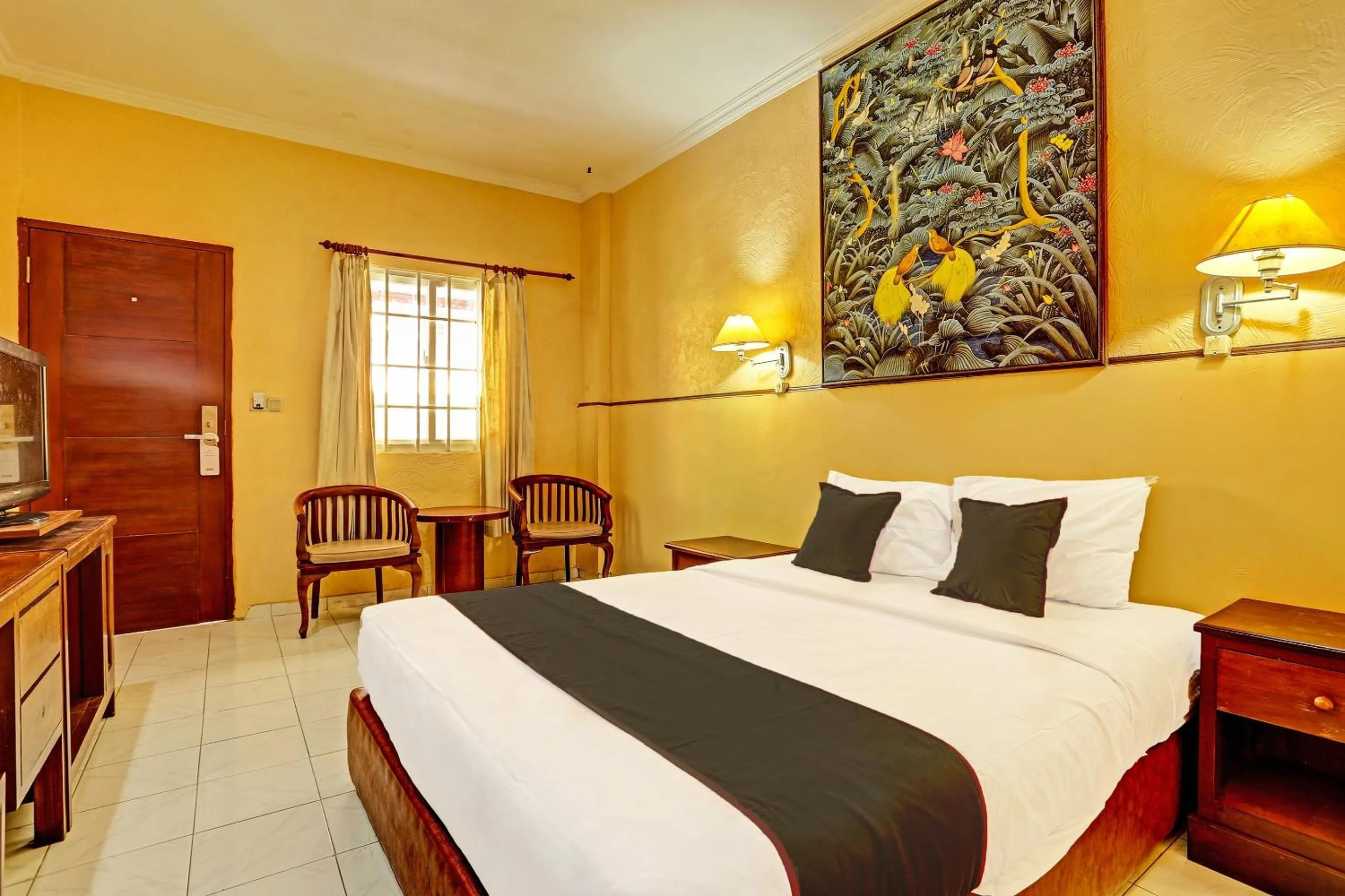 Bedroom in Collection O 91081 New Arena Hotel