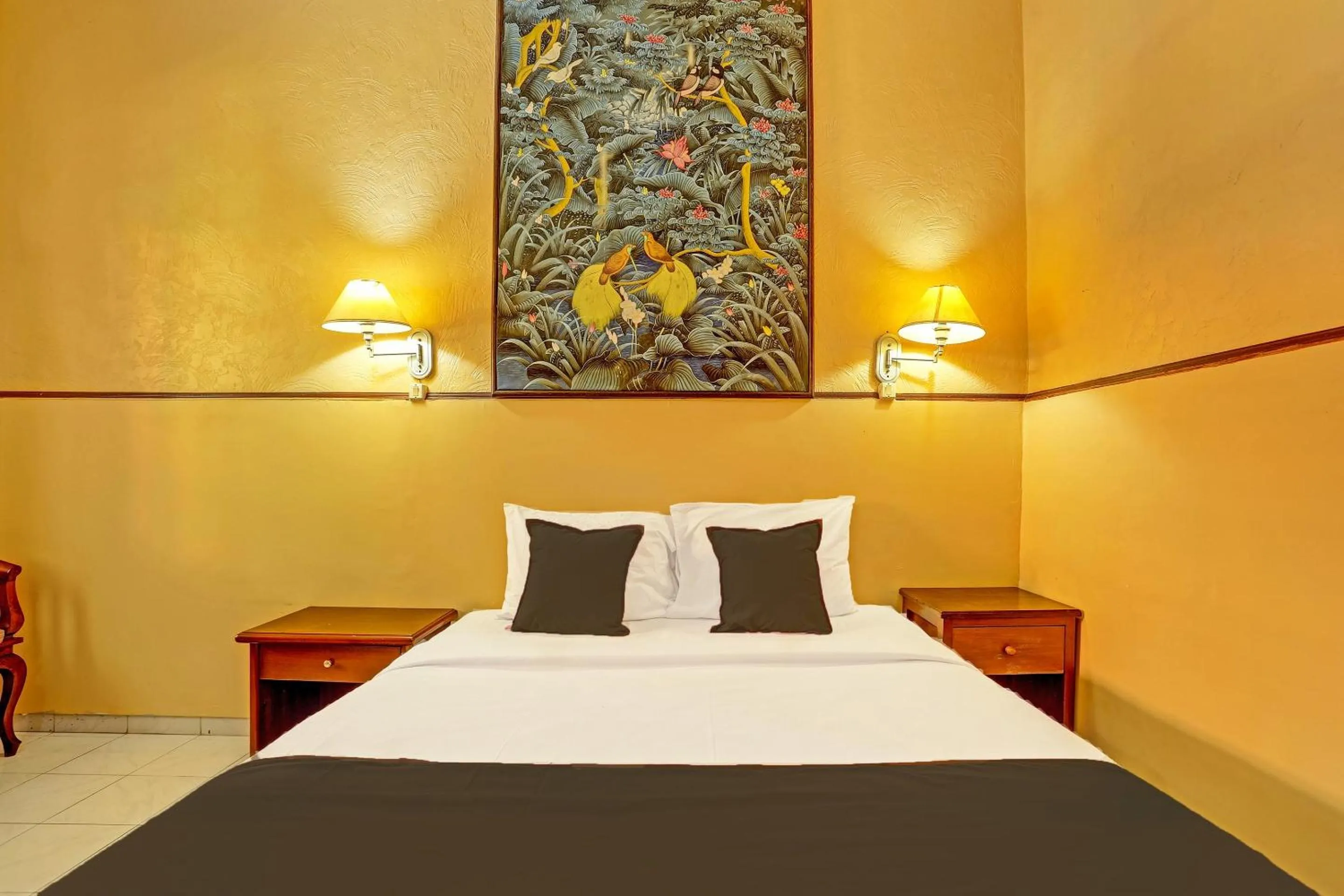 Bedroom in Collection O 91081 New Arena Hotel