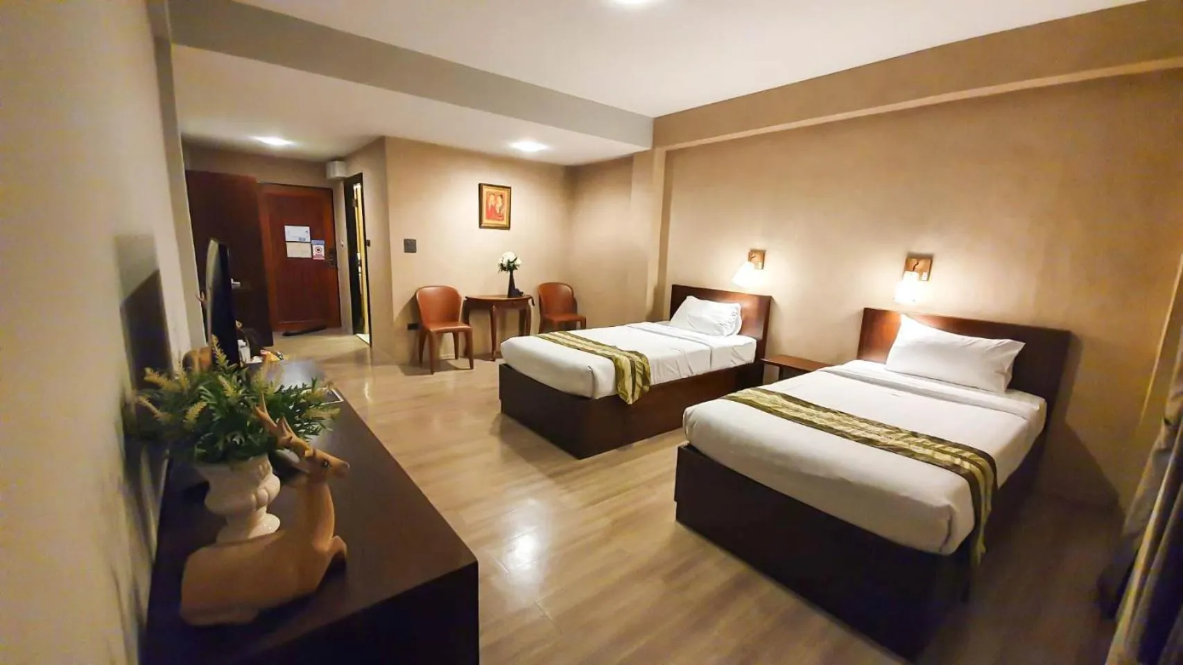 Bed in Big Tree Old Town Hotel