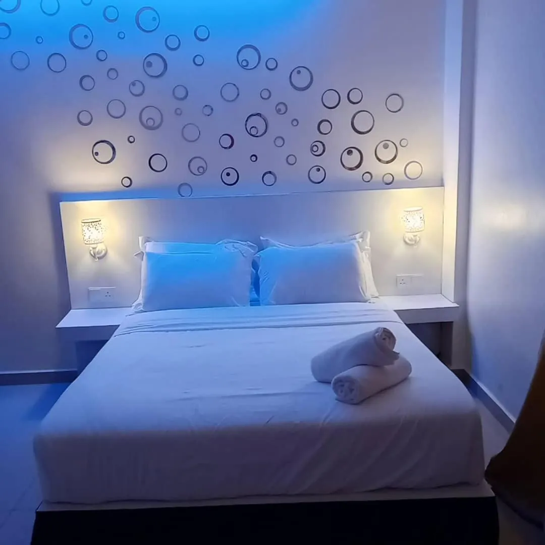 Bed in Sunsega Hotel