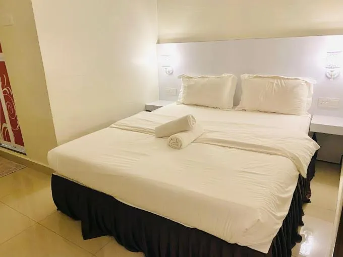 Bed in Sunsega Hotel