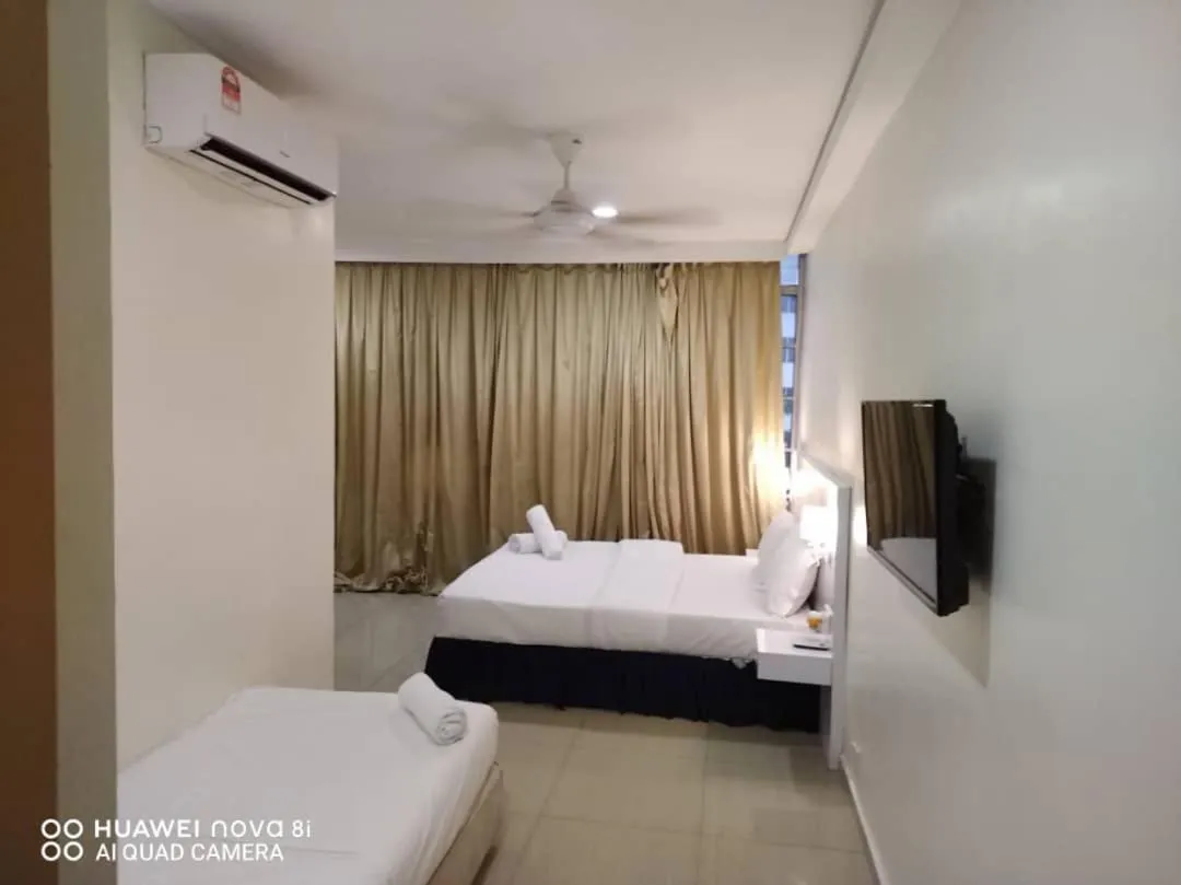 Bed in Sunsega Hotel