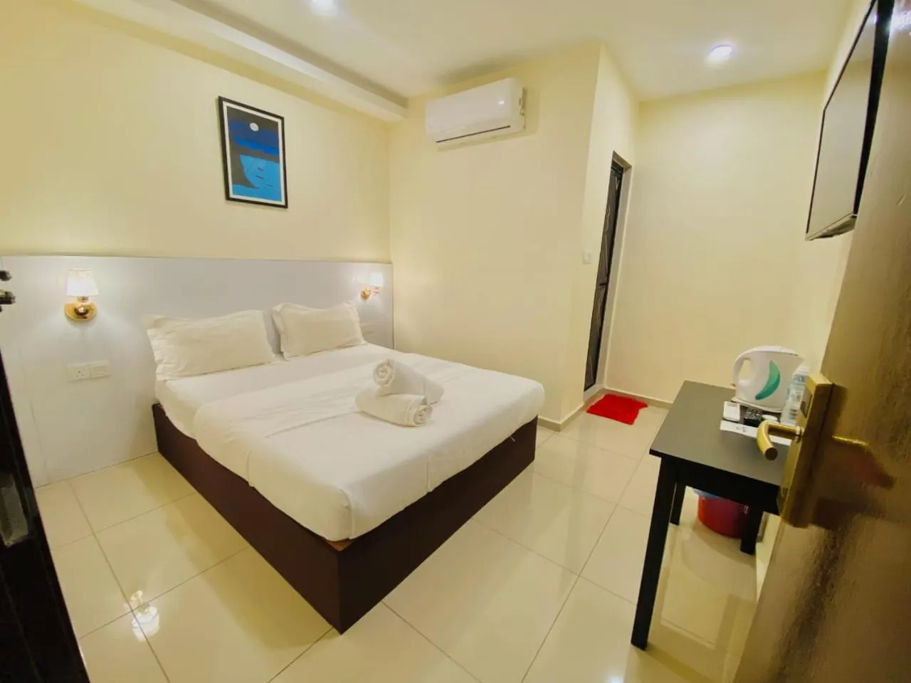 Bed in Sunsega Hotel