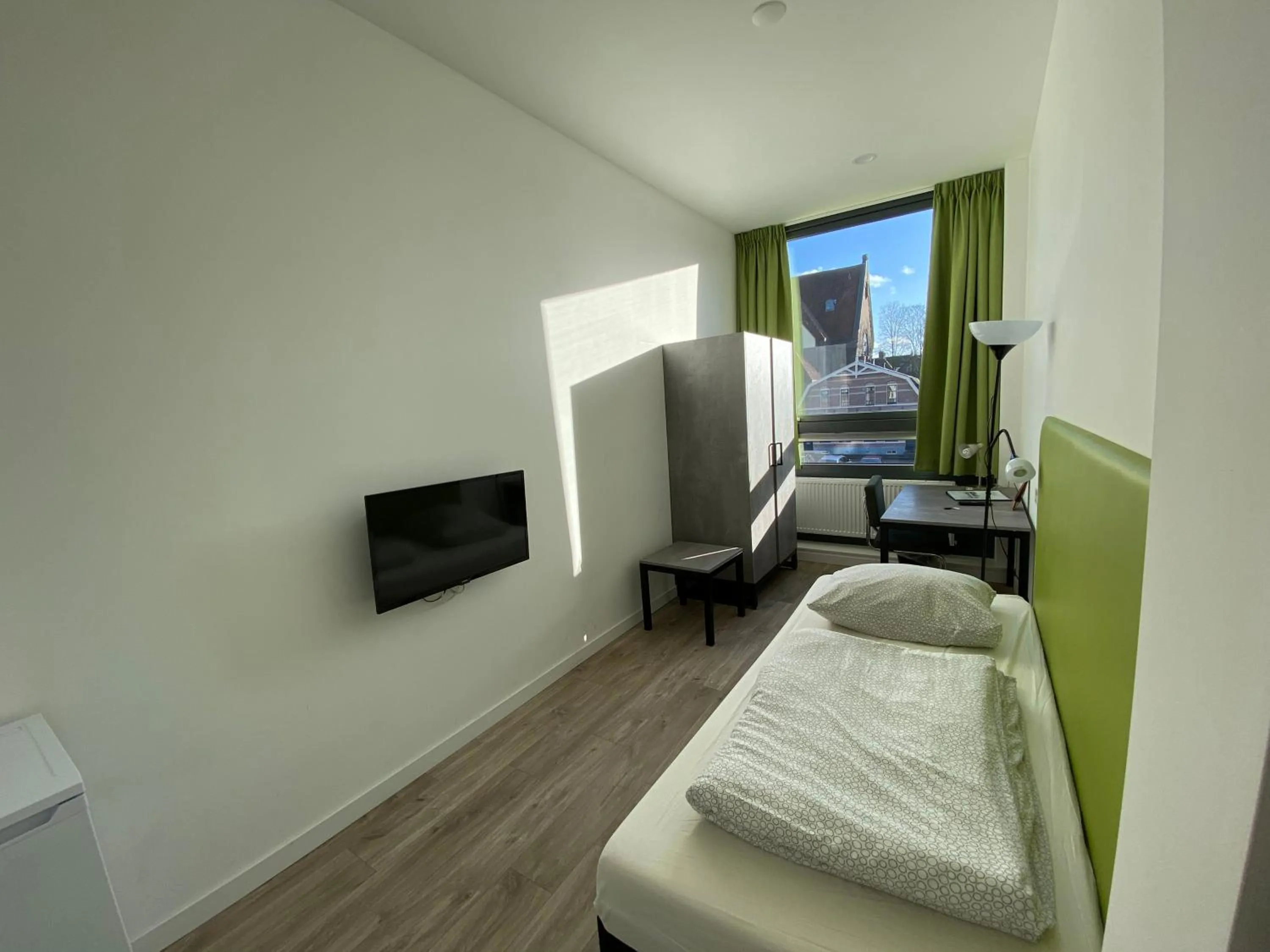 Photo of the whole room, Bed in Short Stay Wageningen