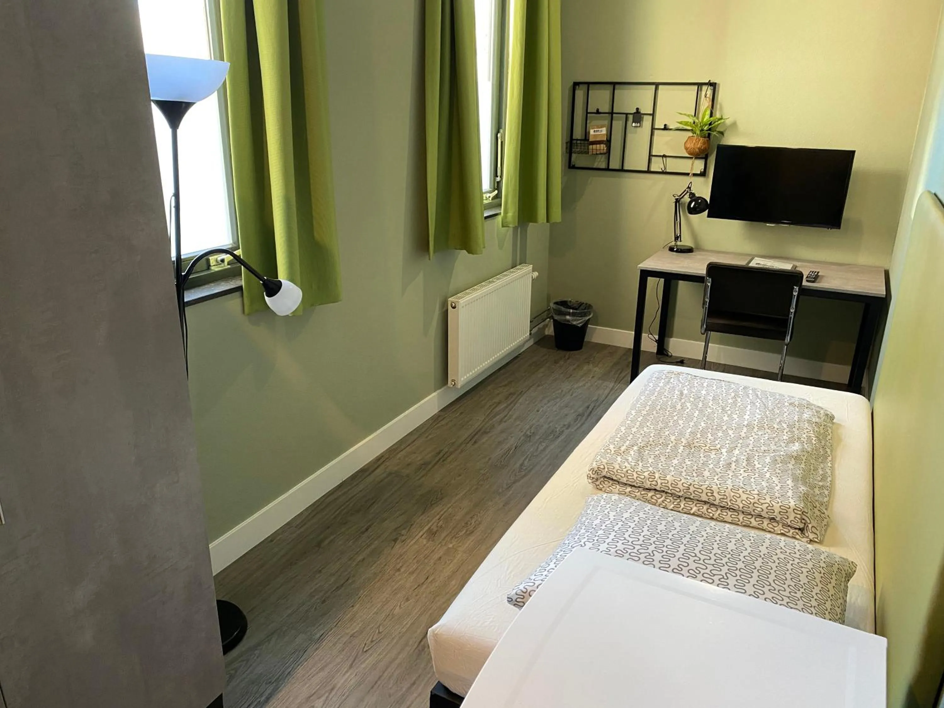 Living room, Bed in Short Stay Wageningen