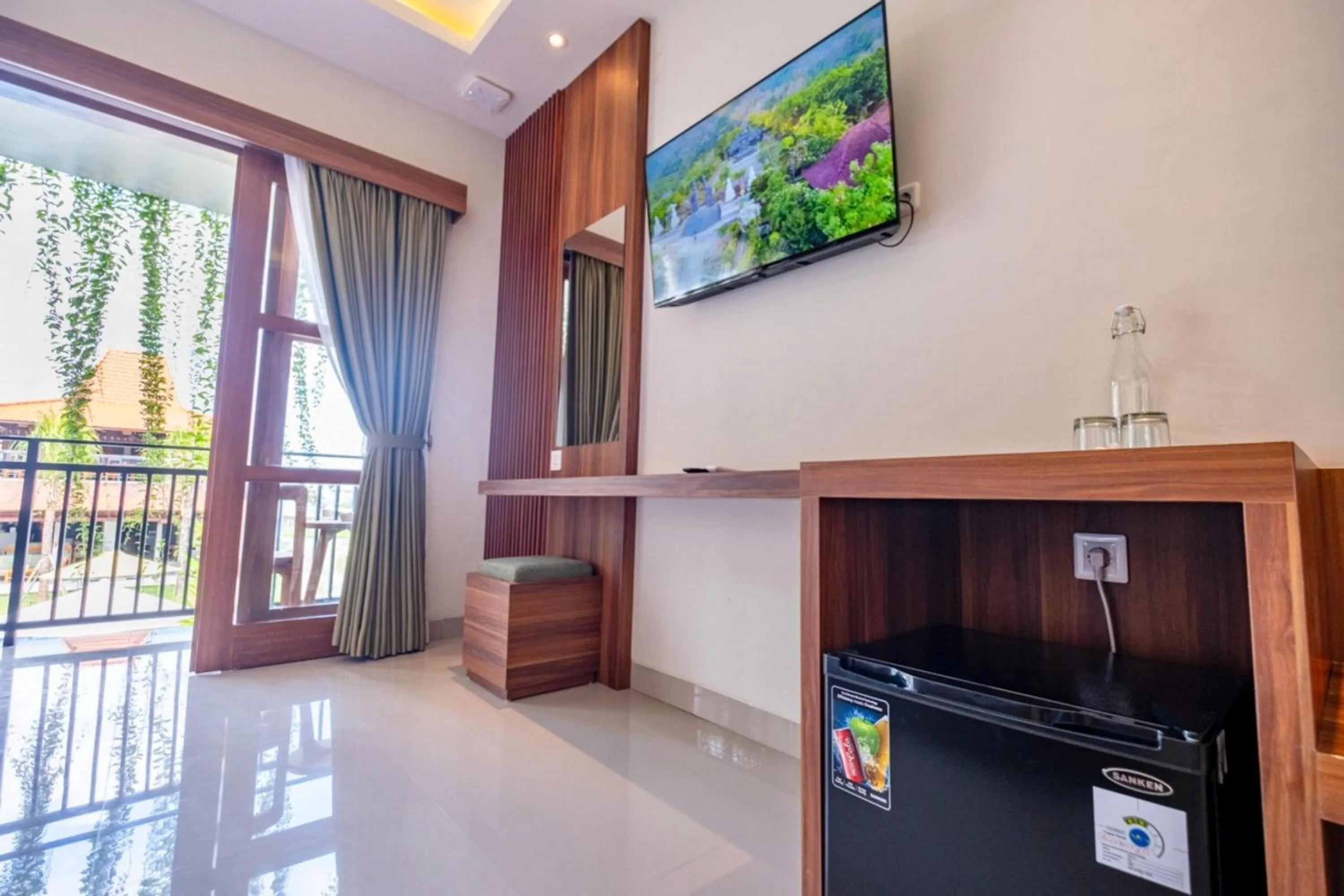 Communal lounge/ TV room in Puri Kaja House