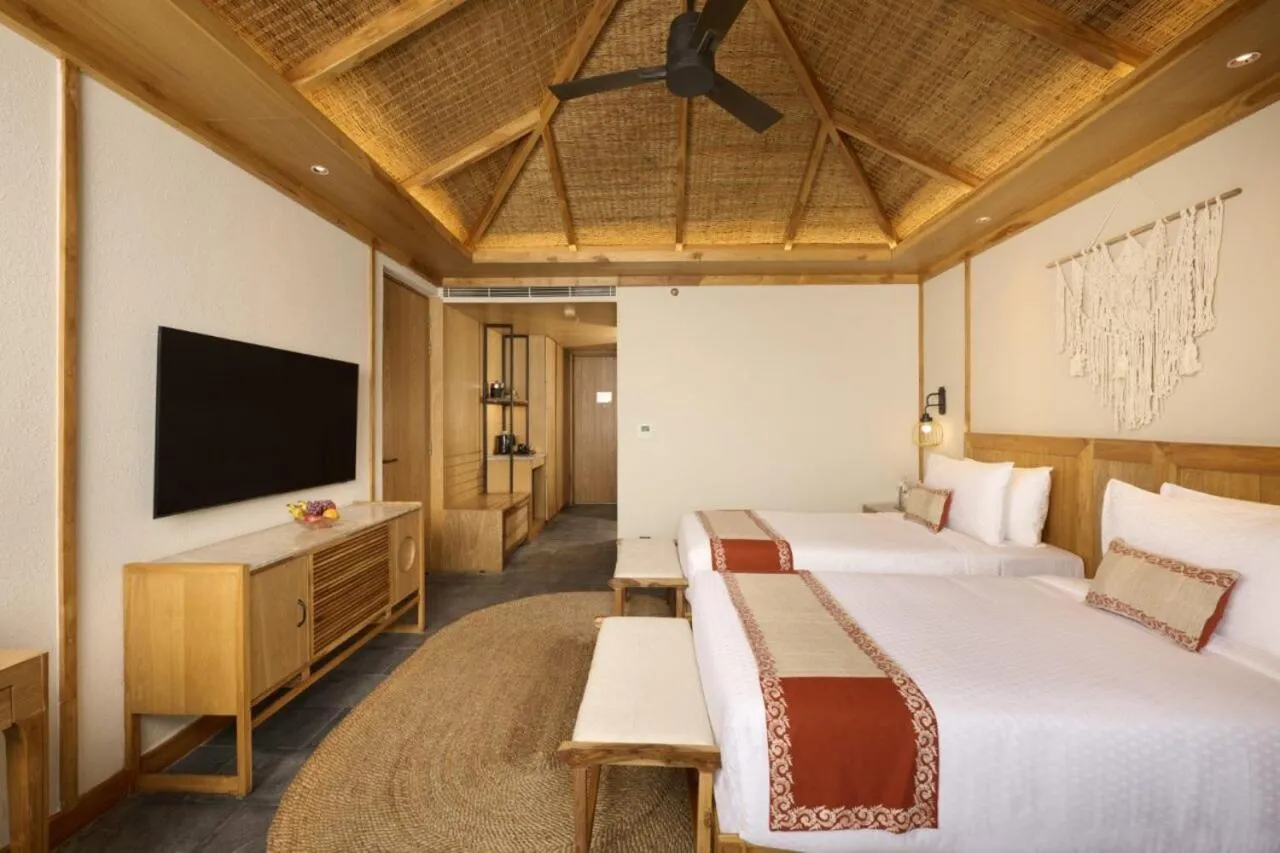 Bedroom, Bed in Royal Tulip Chitwan Nepal