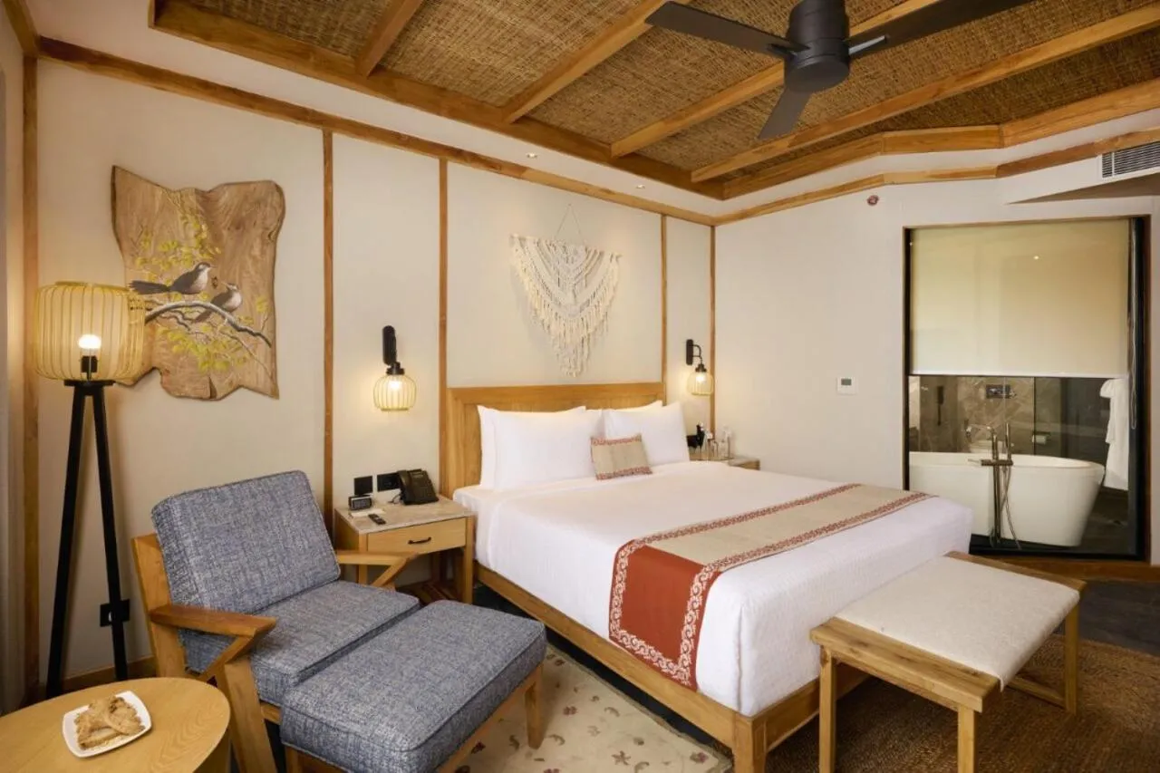 Bedroom, Bed in Royal Tulip Chitwan Nepal