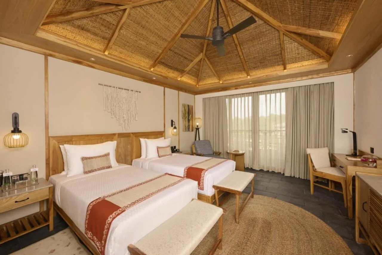 Bedroom, Bed in Royal Tulip Chitwan Nepal