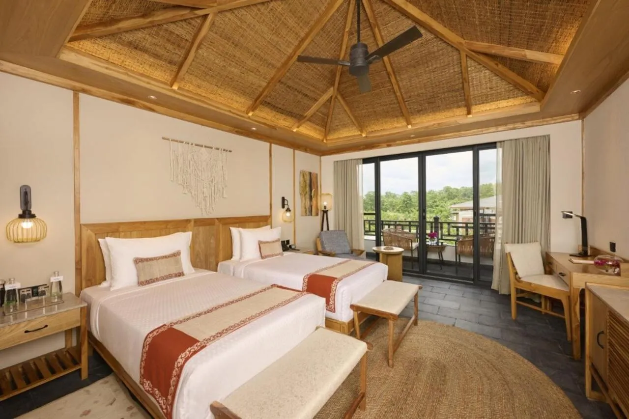 Bedroom, Bed in Royal Tulip Chitwan Nepal