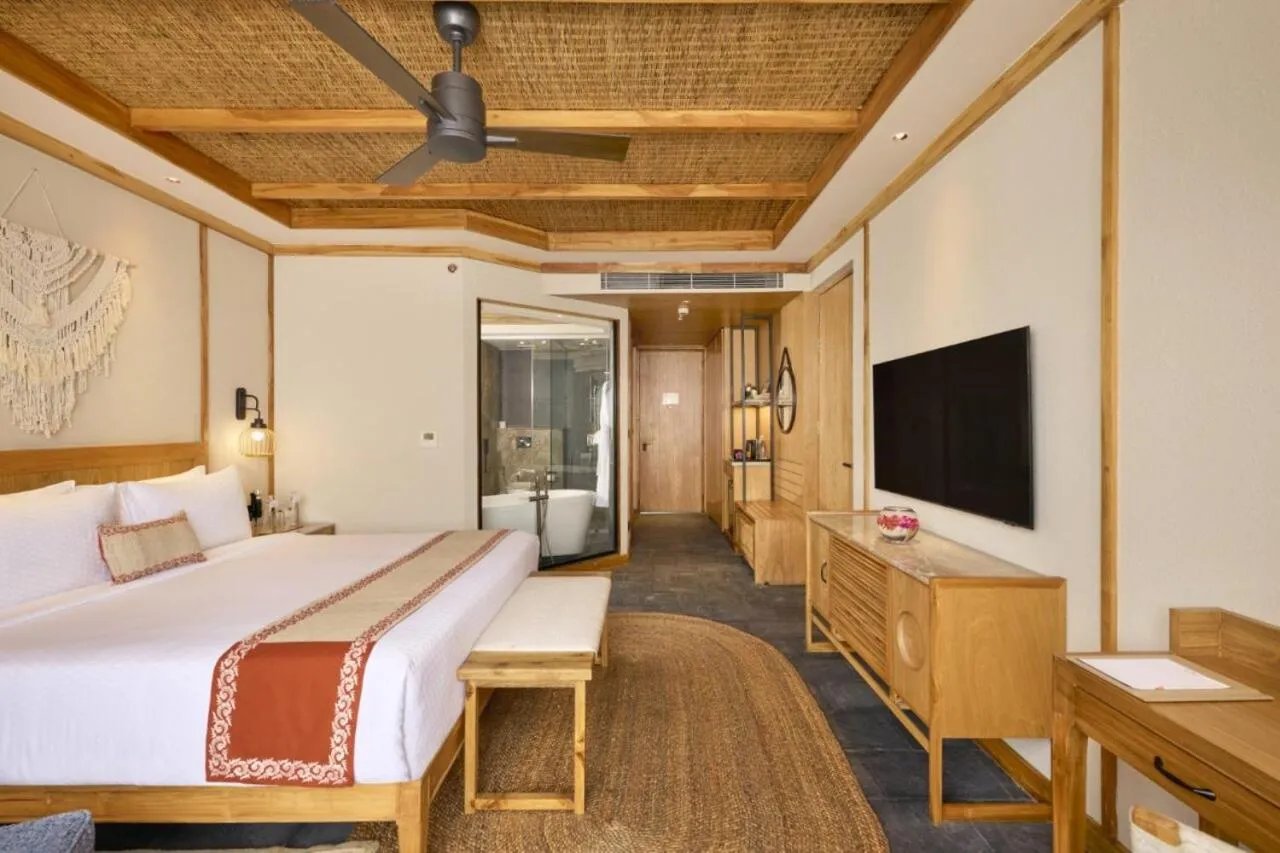 Bedroom, Bed in Royal Tulip Chitwan Nepal