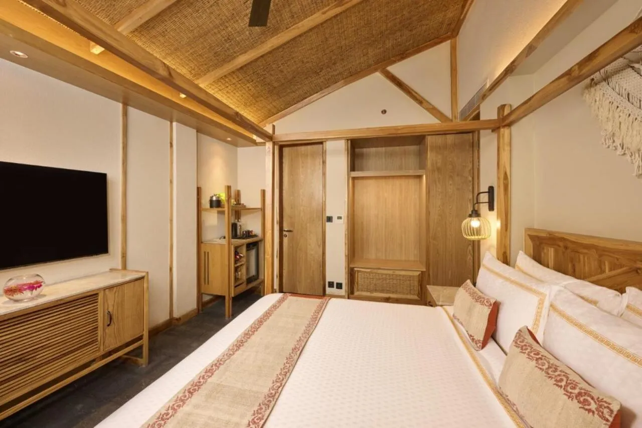 Bedroom, Bed in Royal Tulip Chitwan Nepal