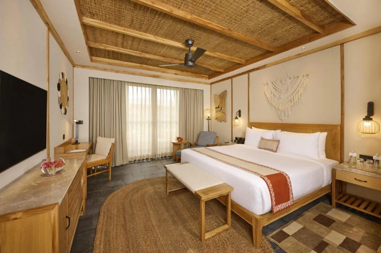 Bedroom, Bed in Royal Tulip Chitwan Nepal