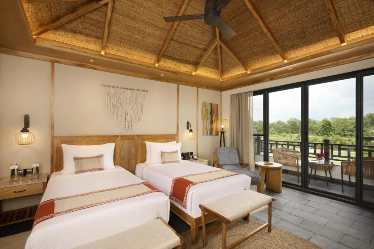 Bedroom, Bed in Royal Tulip Chitwan Nepal