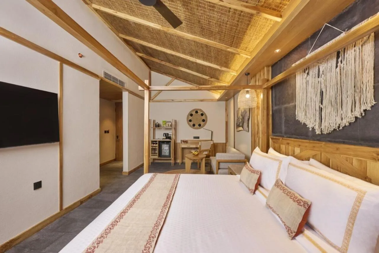 Bedroom, Bed in Royal Tulip Chitwan Nepal