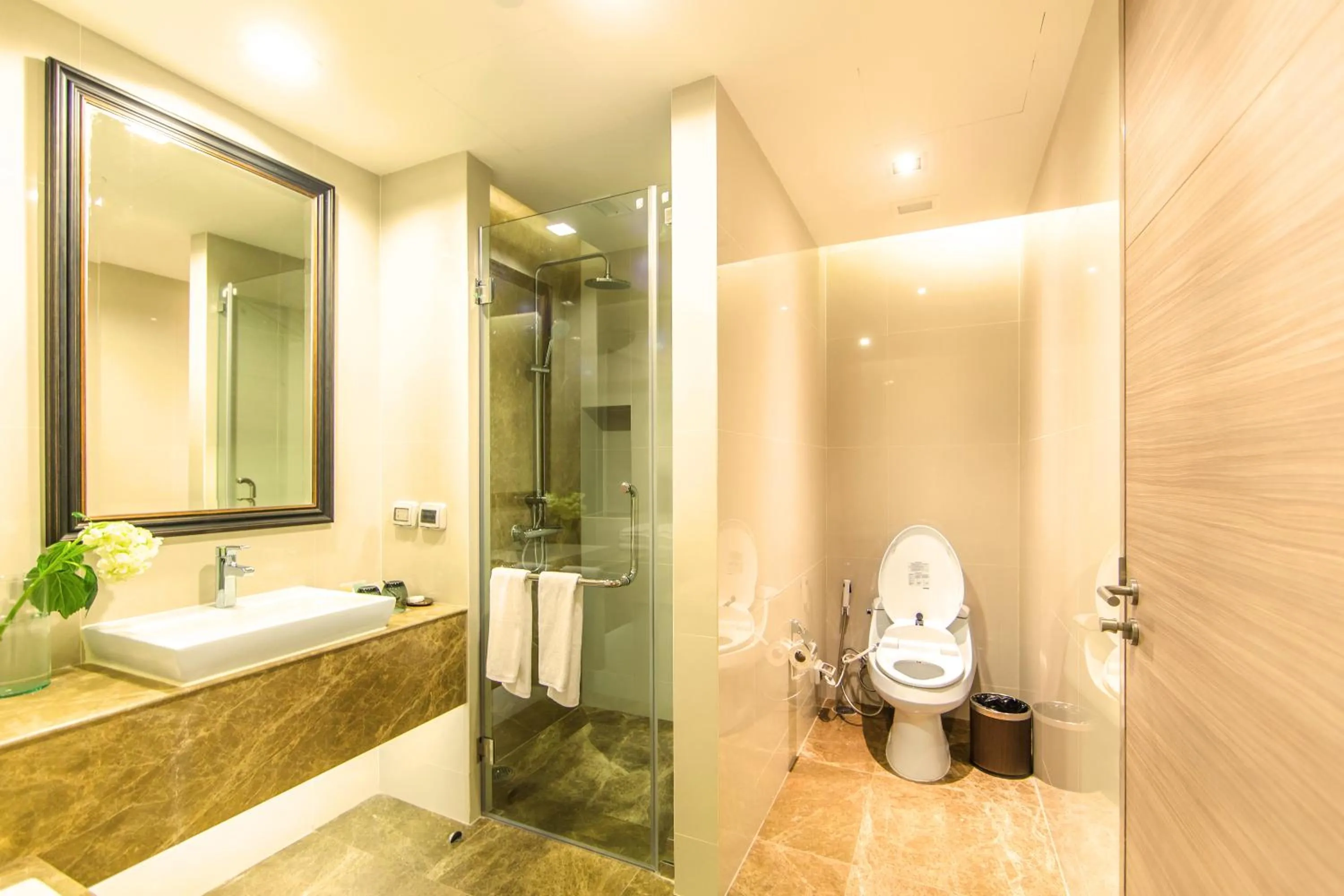 Bathroom in Qiss Residence by Bliston