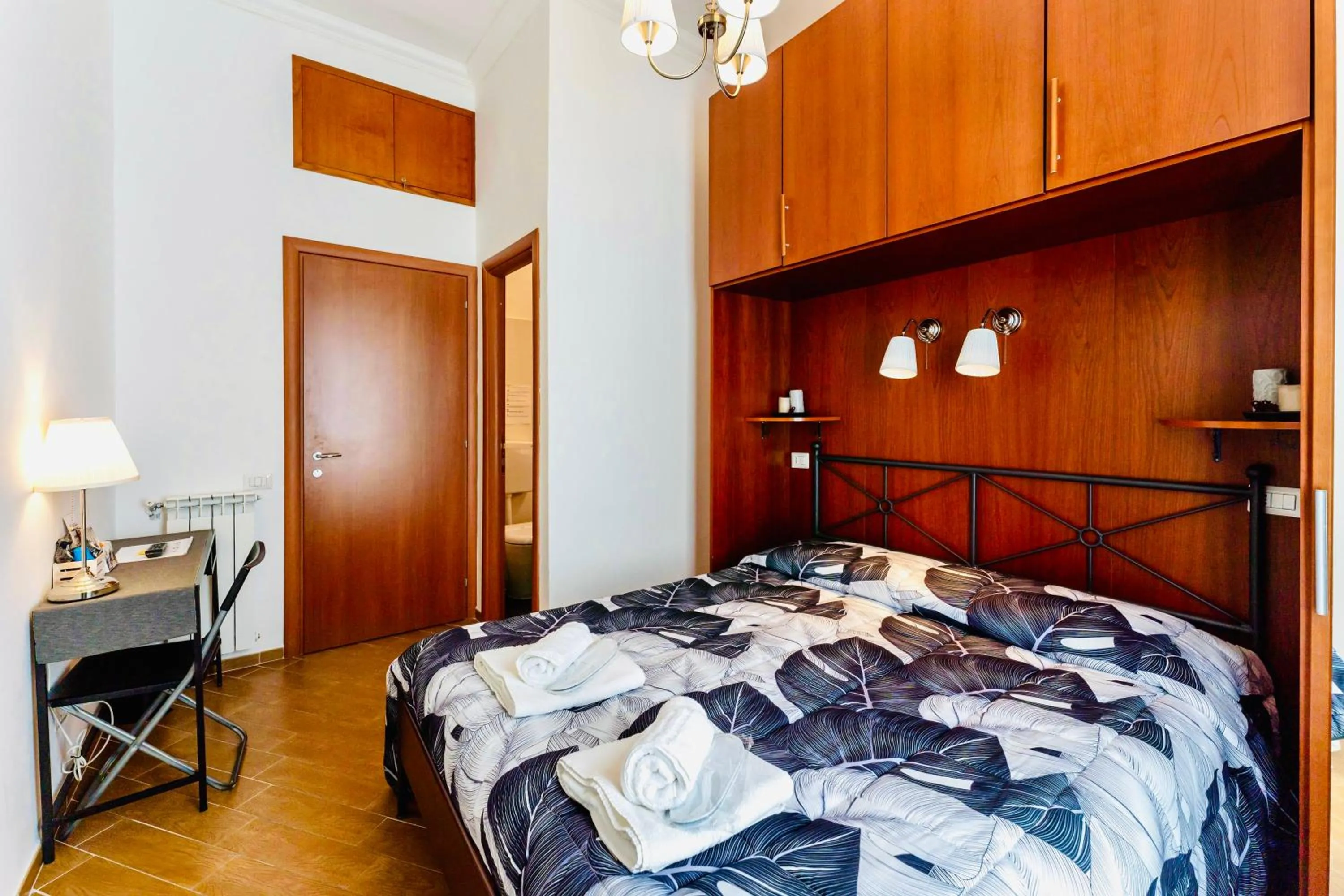 Bed in MICLAD Colosseum Guest House