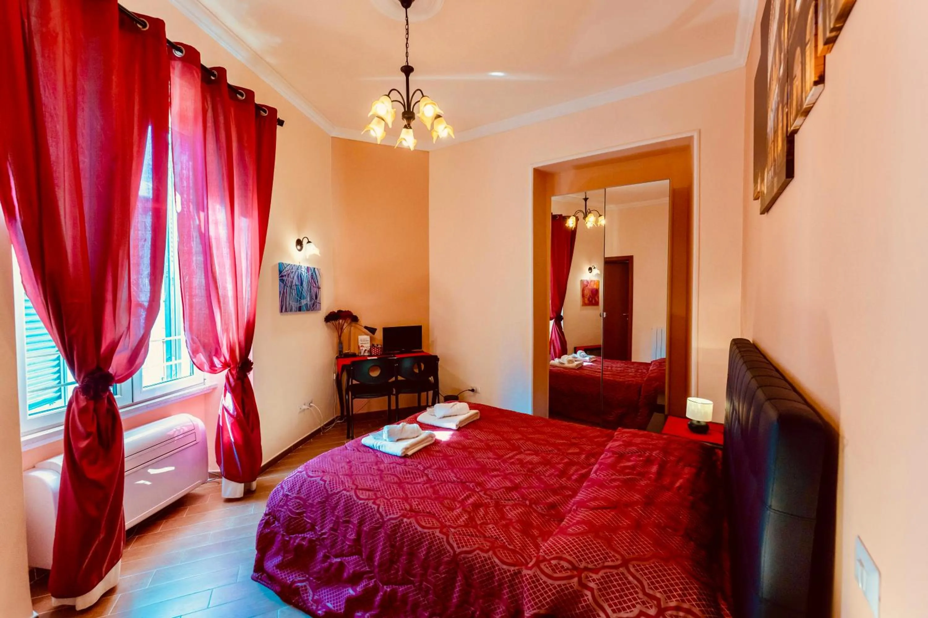 Bed in MICLAD Colosseum Guest House