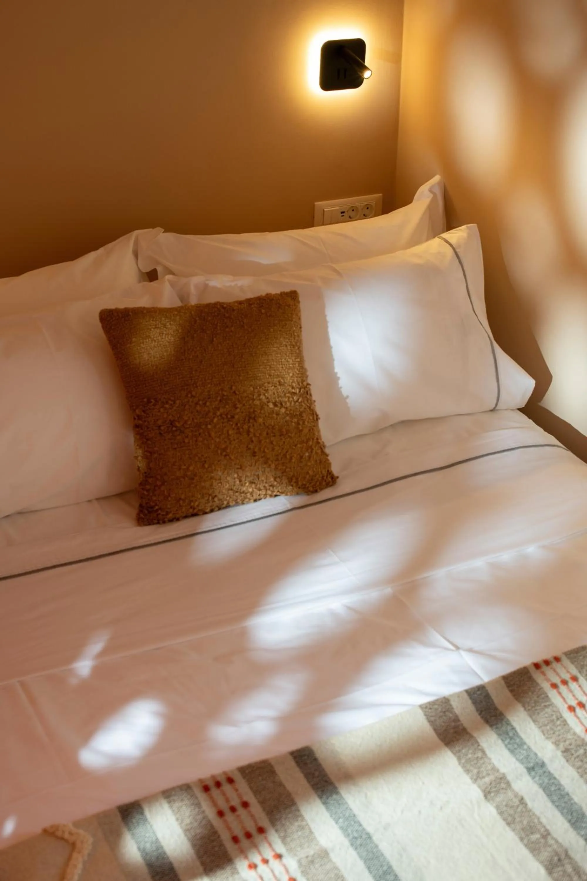 Bed in Terra Verde Oia by K&K