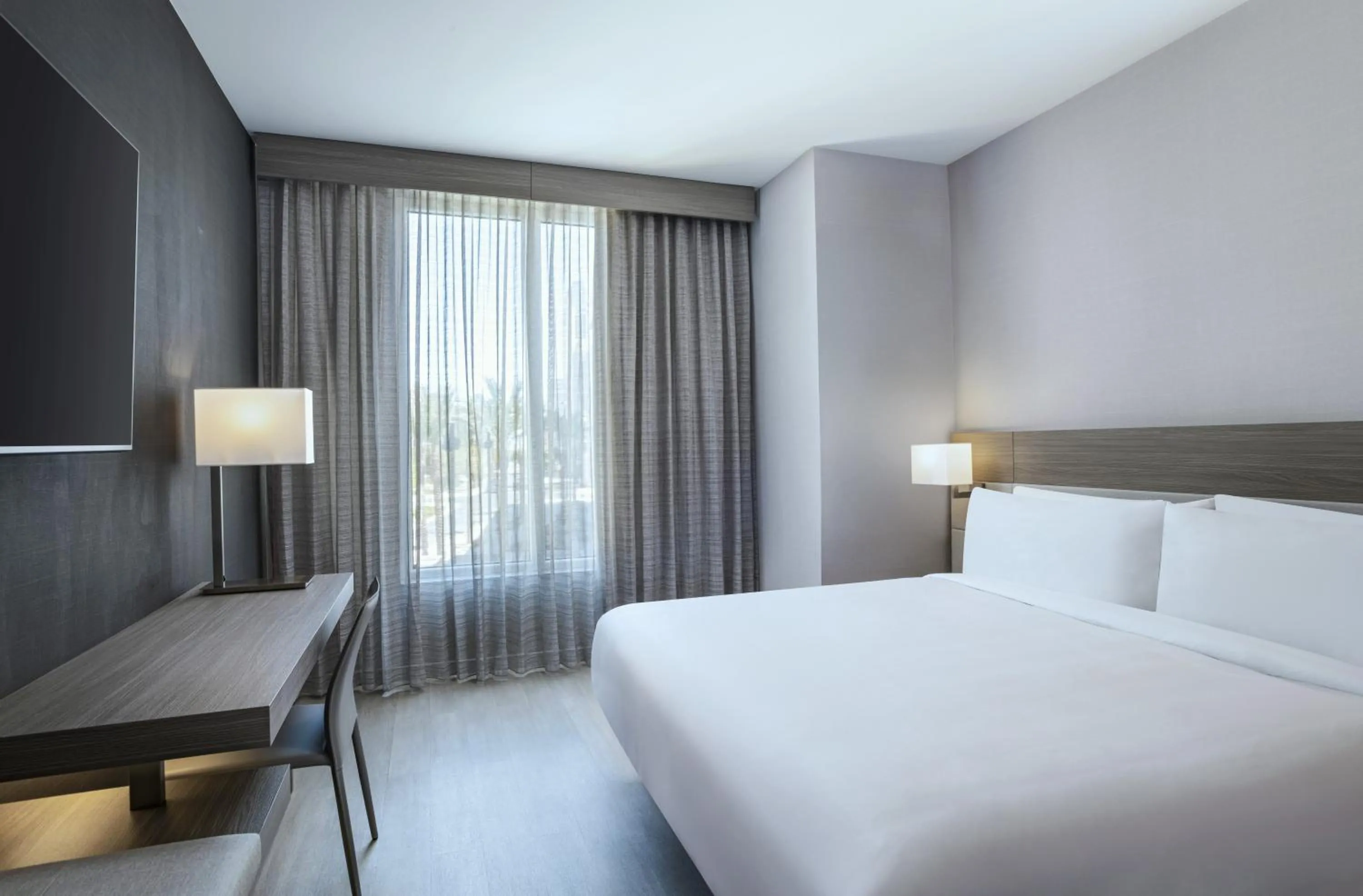 Photo of the whole room, Bed in AC Hotel by Marriott Las Vegas Symphony Park