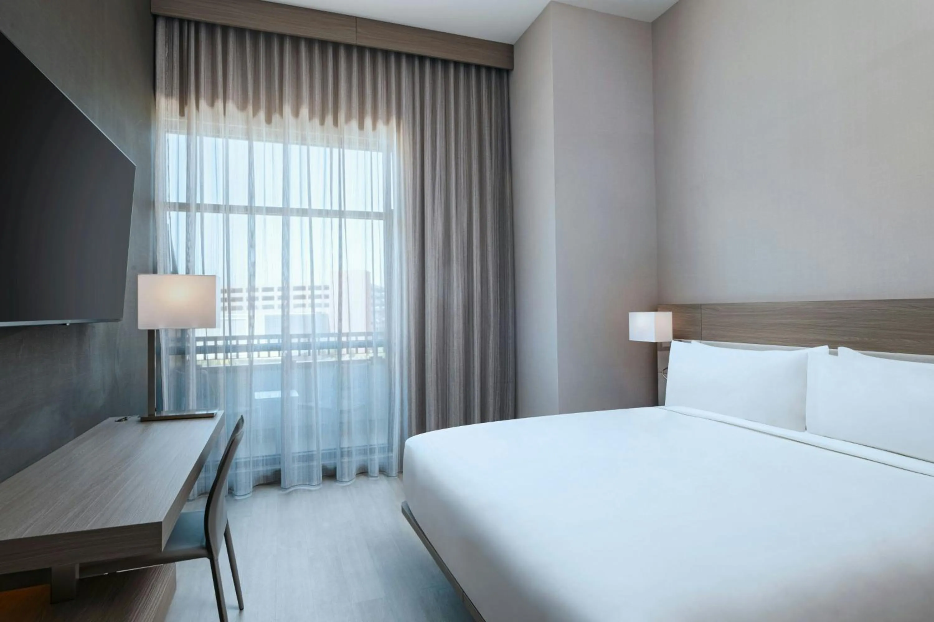 Photo of the whole room, Bed in AC Hotel by Marriott Las Vegas Symphony Park