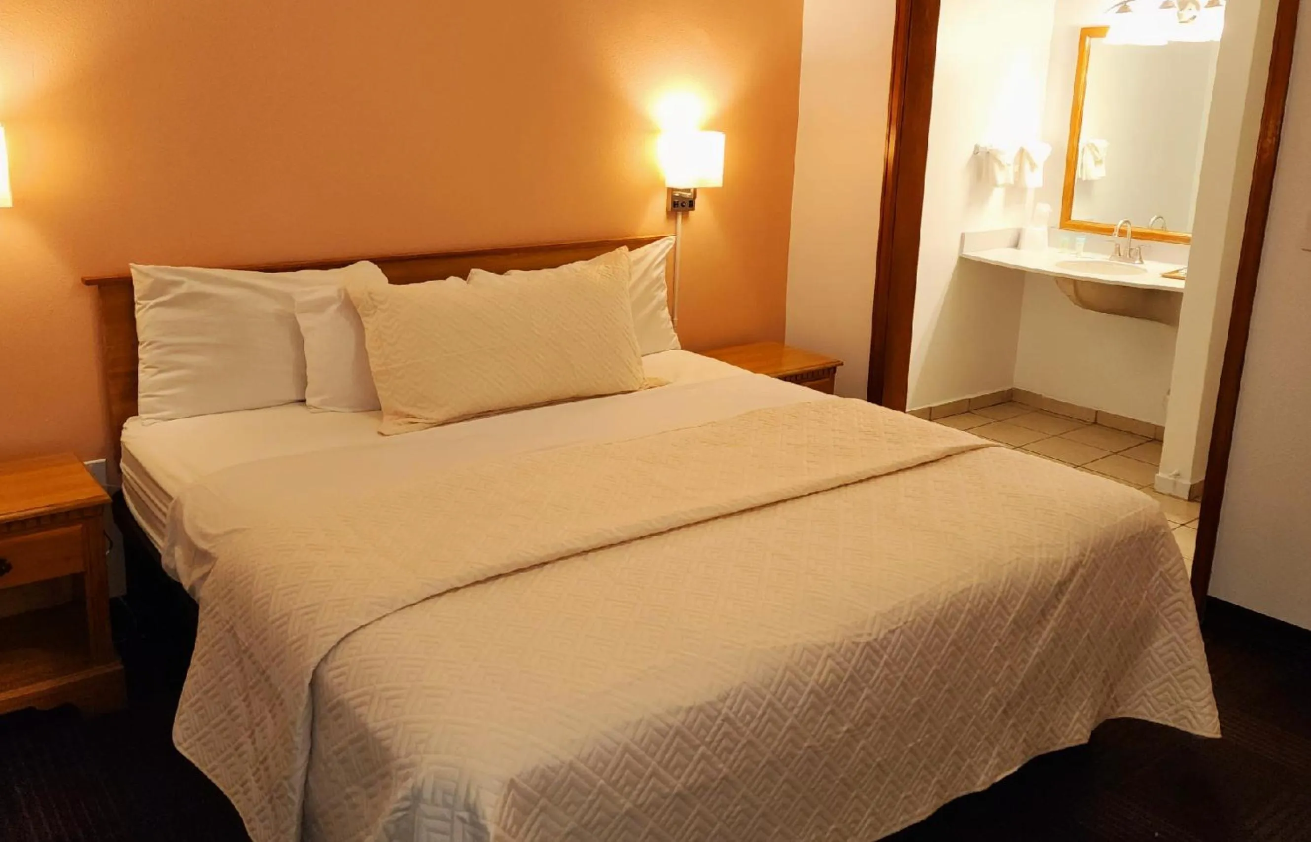 Bed in Silver Saddle Motel