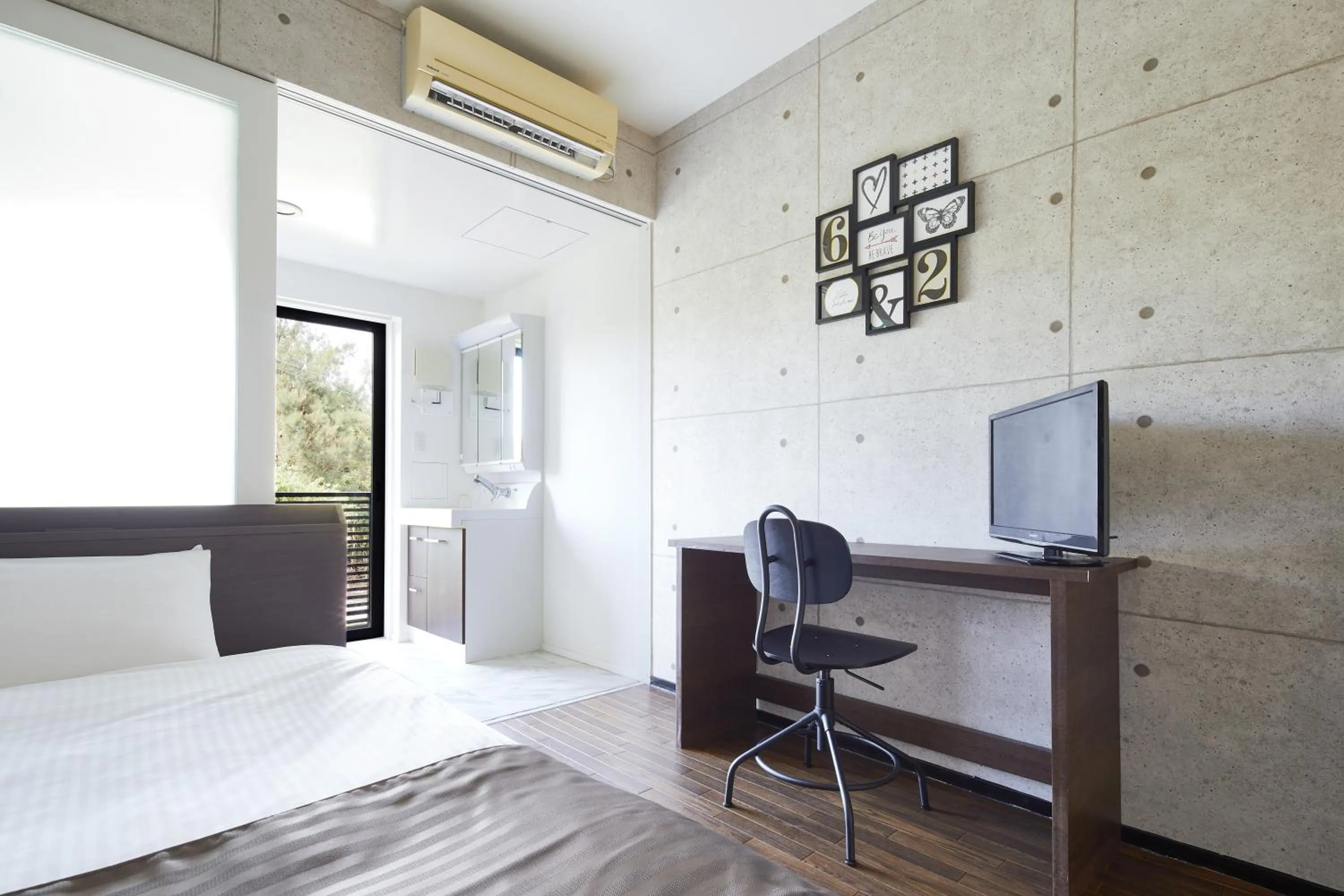 Bed in E-horizon Resort Condominium Sesoko