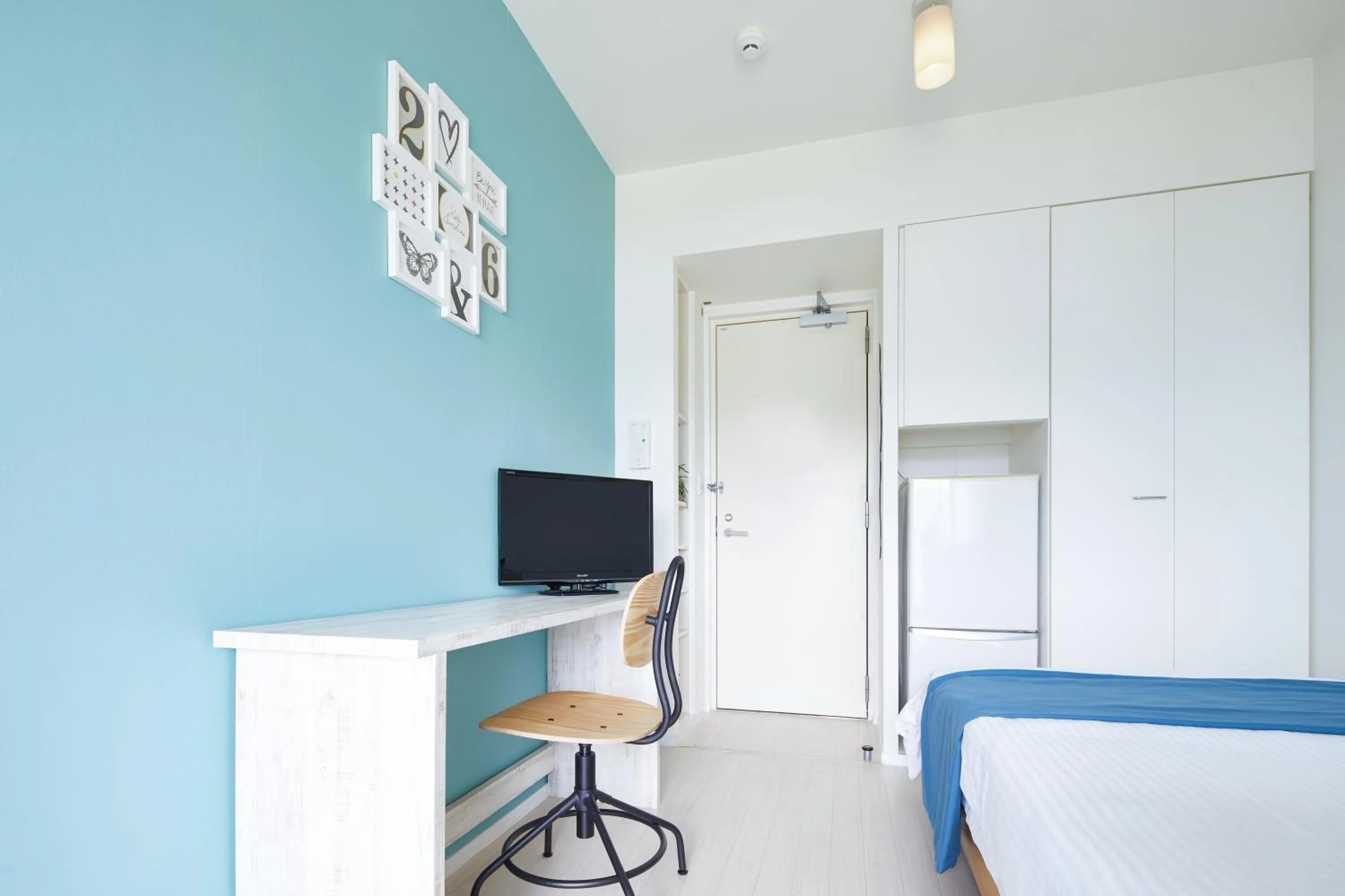 Bed in E-horizon Resort Condominium Sesoko