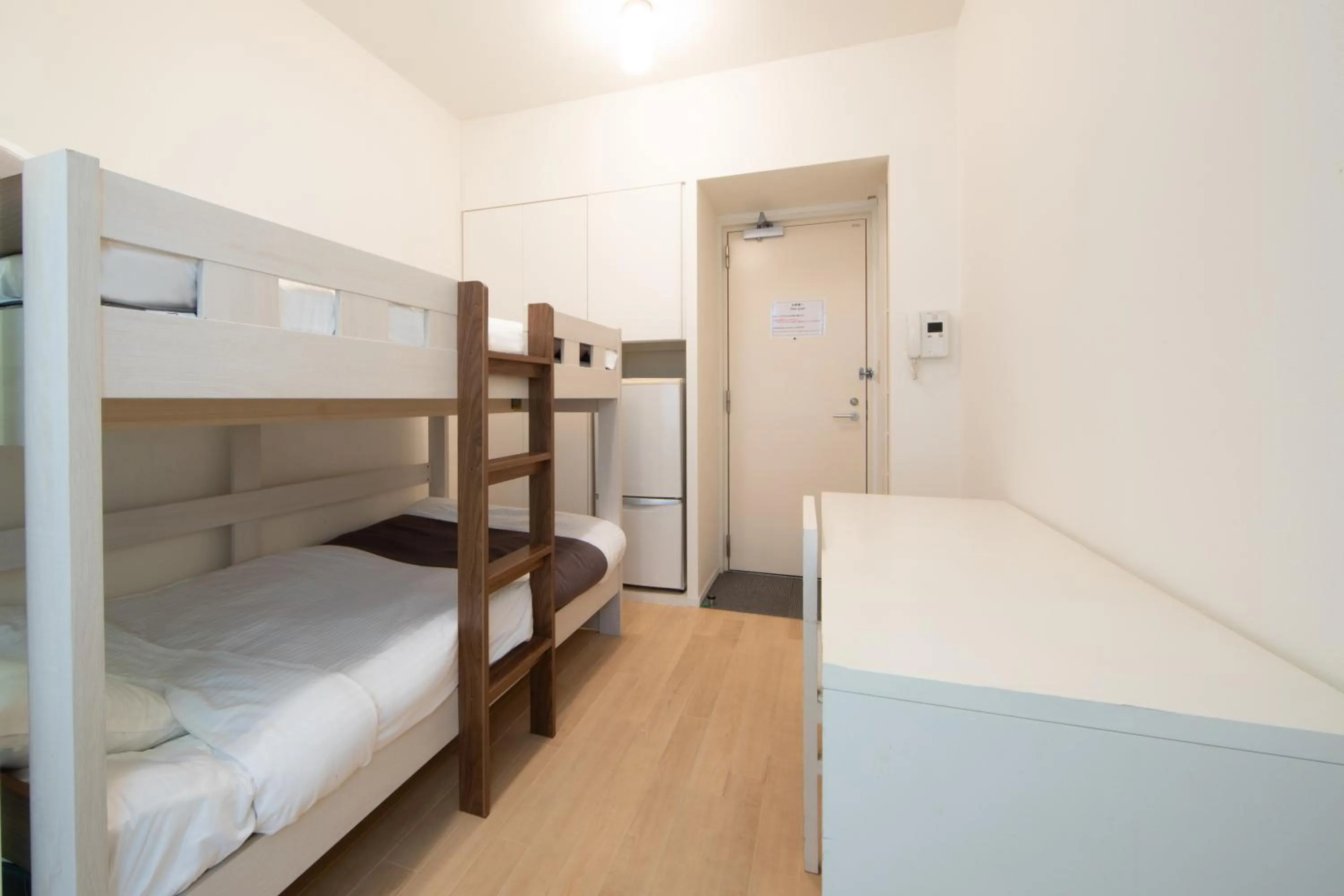 Photo of the whole room, Bed in E-horizon Resort Condominium Sesoko