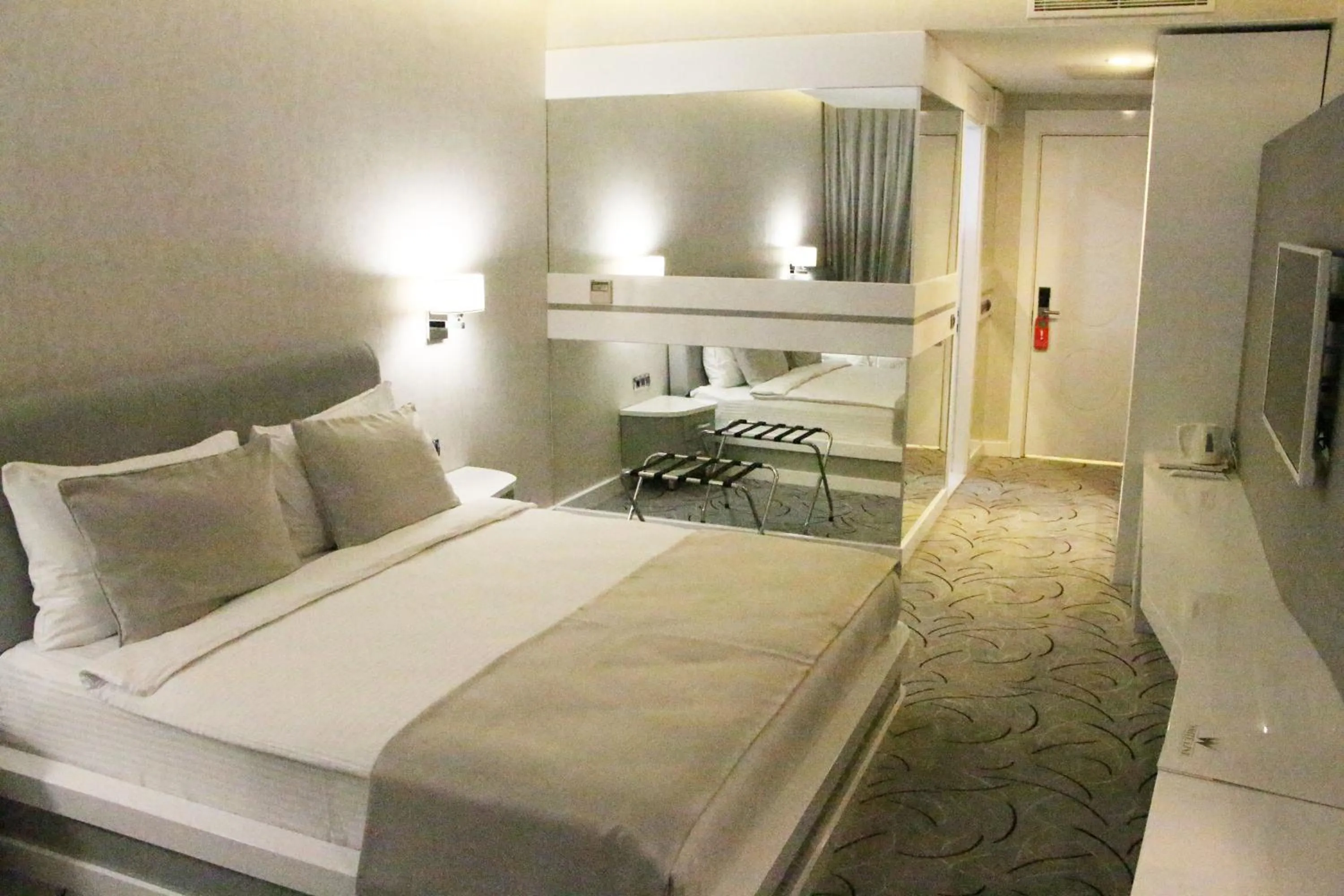 Decorative detail, Bed in White Line Boutique Hotel