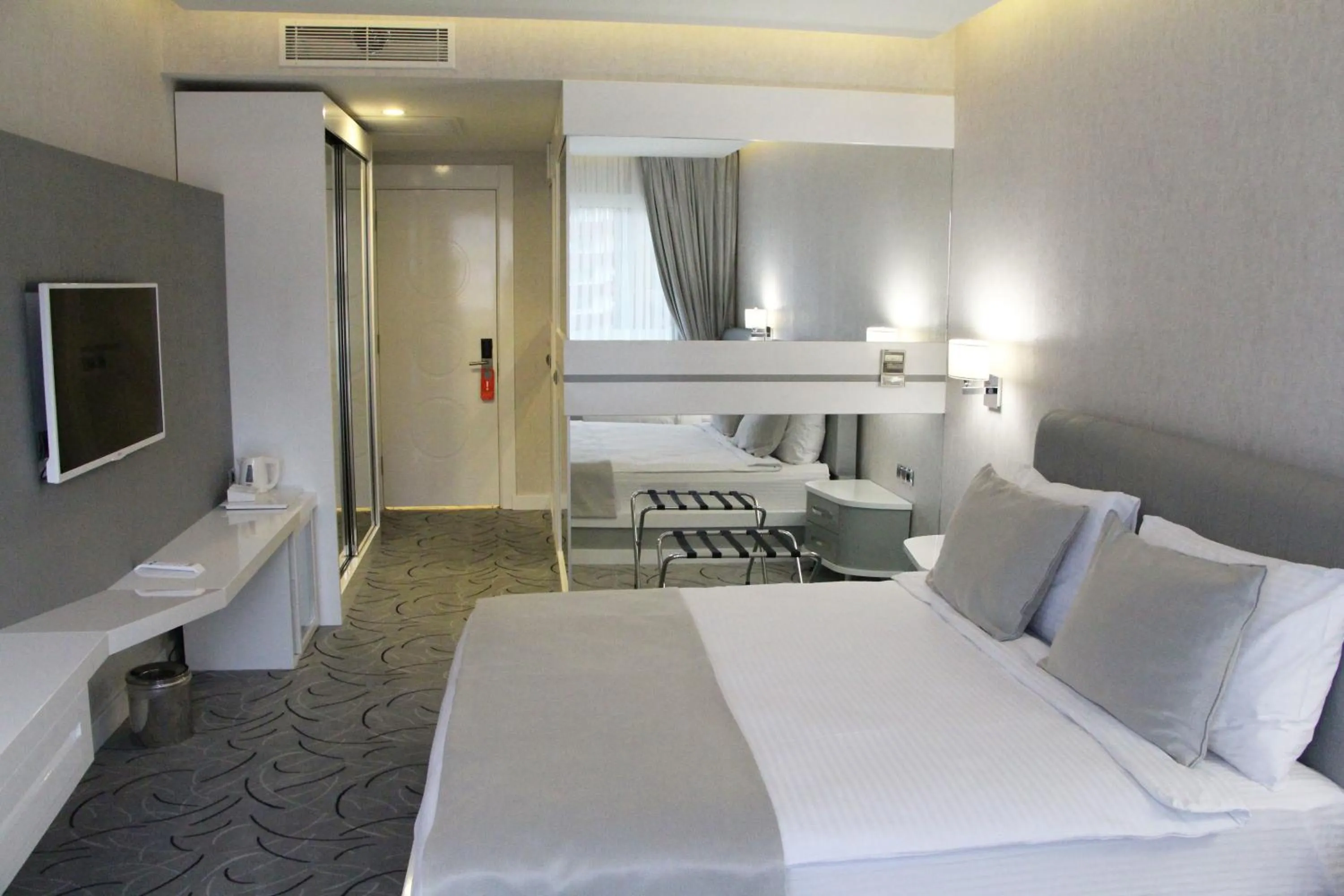 Decorative detail, Bed in White Line Boutique Hotel