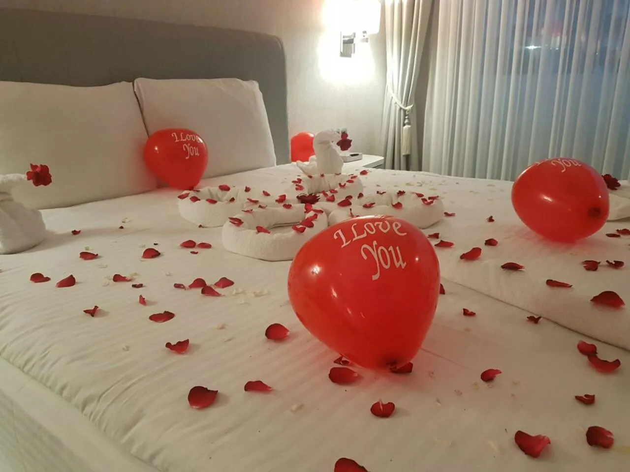 Bed in White Line Boutique Hotel