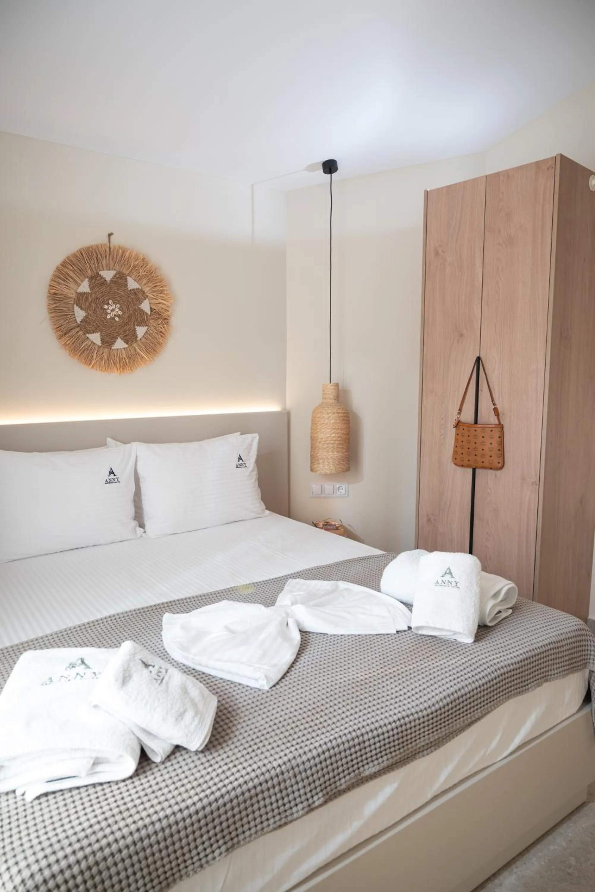 Bed in Anny's Residences & Suites