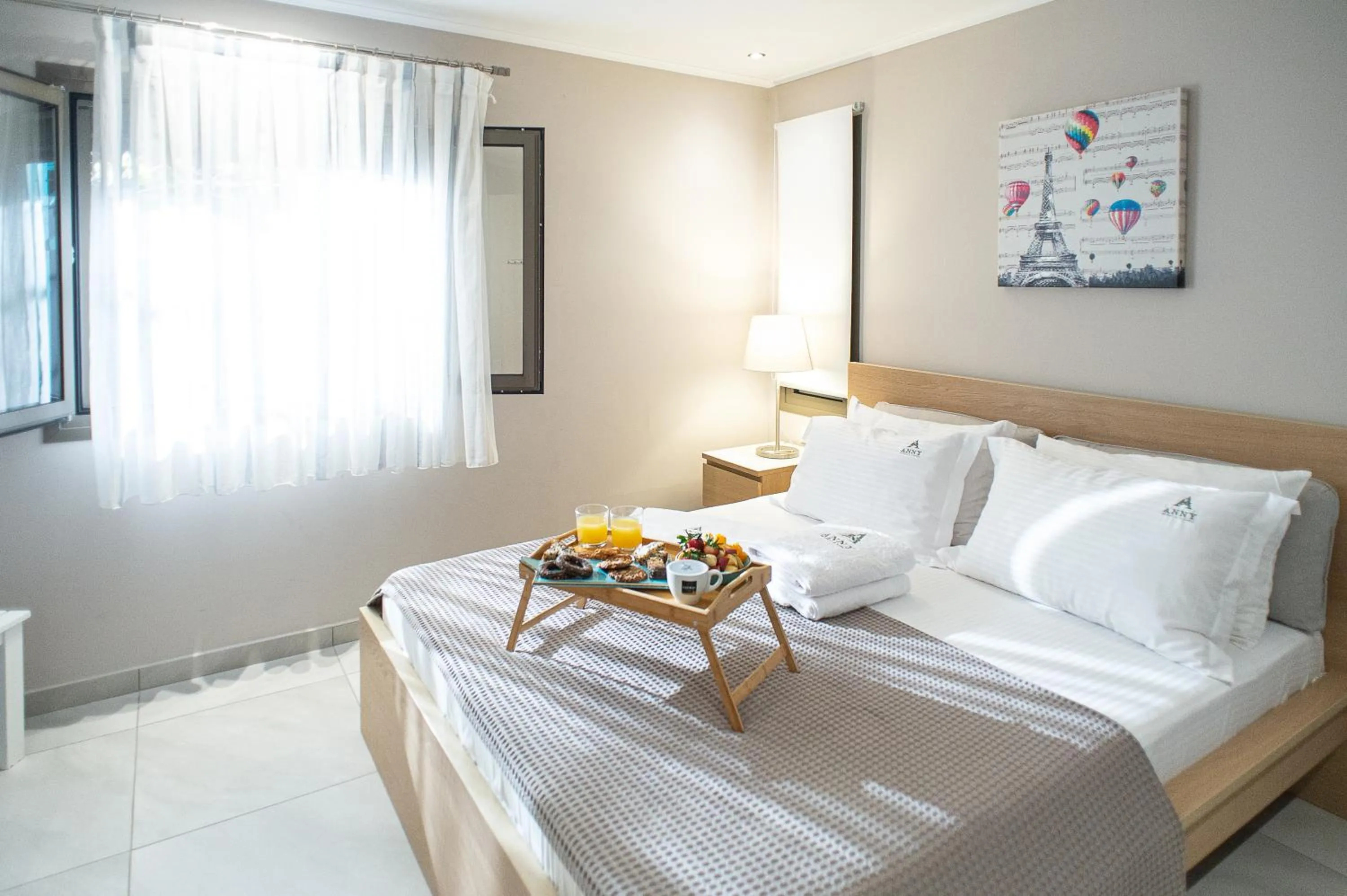 Bed in Anny's Residences & Suites