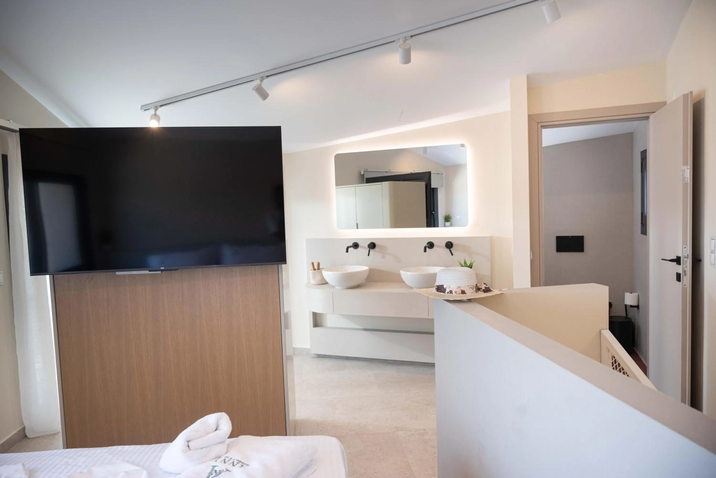 Bed in Anny's Residences & Suites