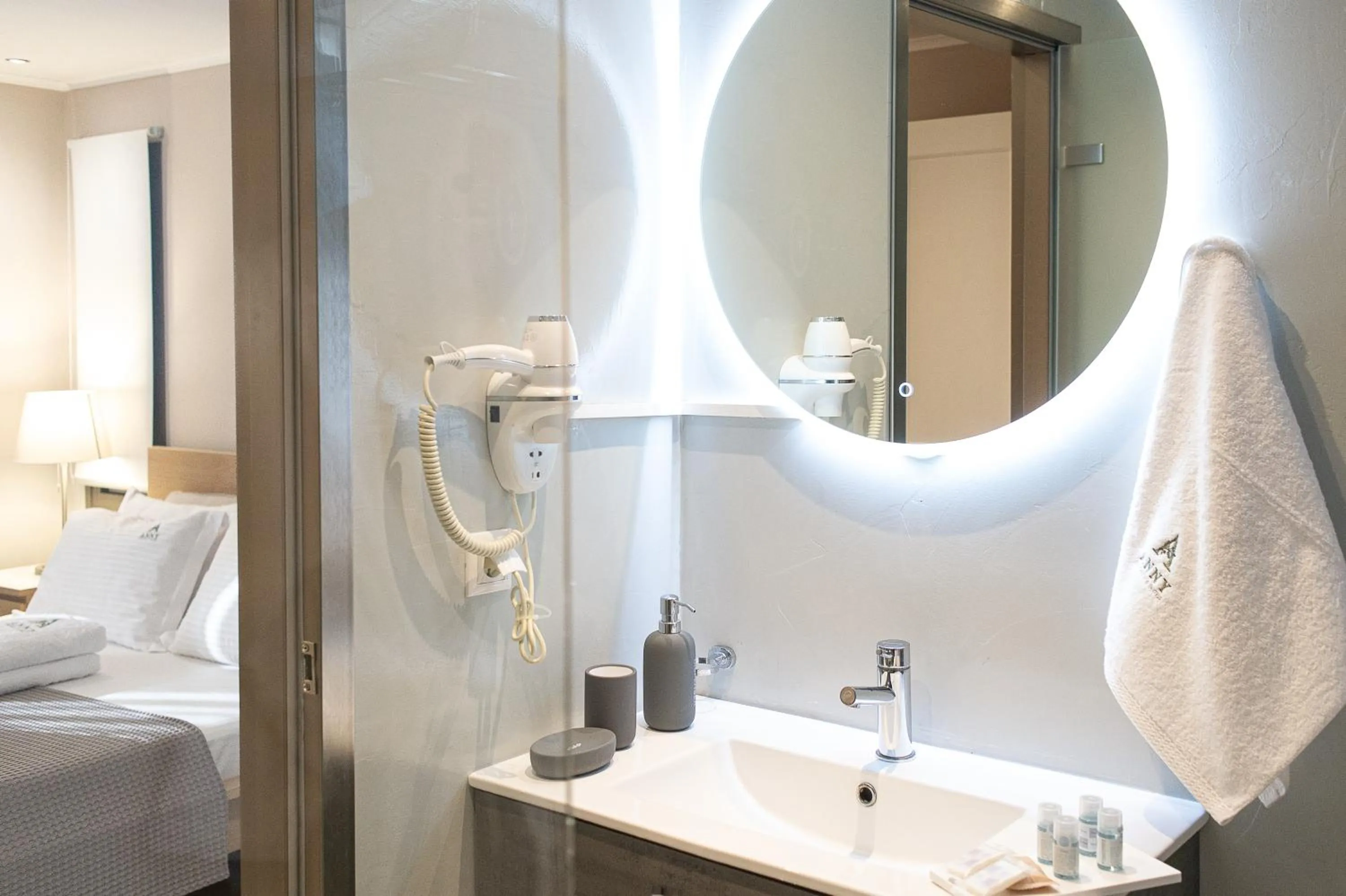 Bed in Anny's Residences & Suites