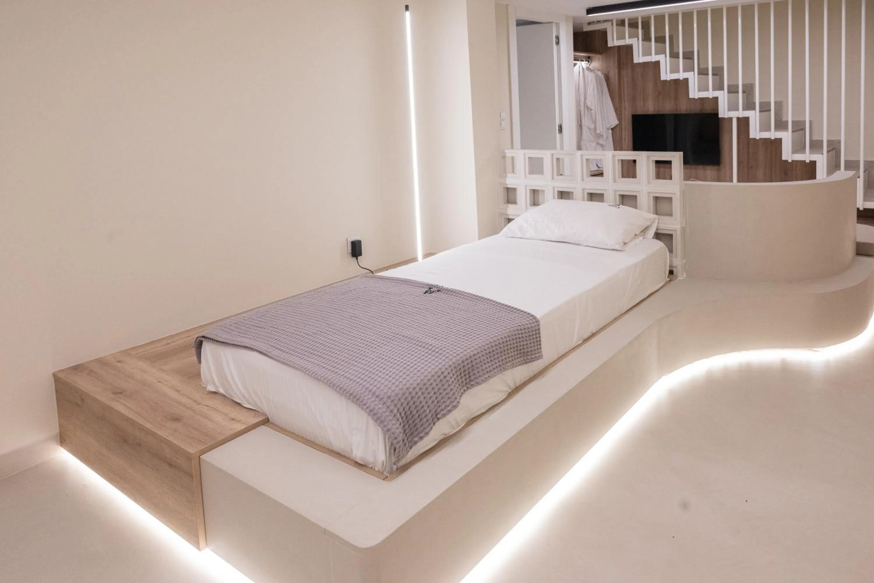 Bed in Anny's Residences & Suites