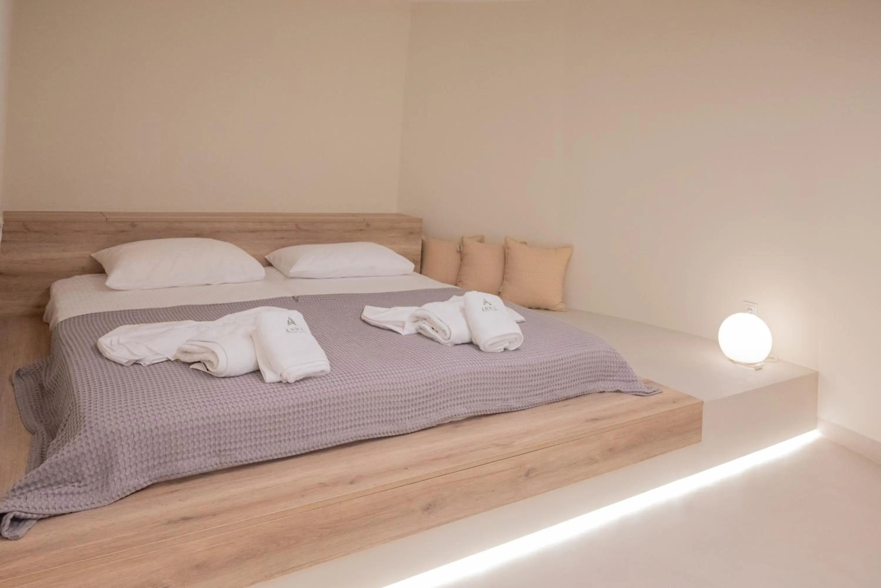 Bed in Anny's Residences & Suites