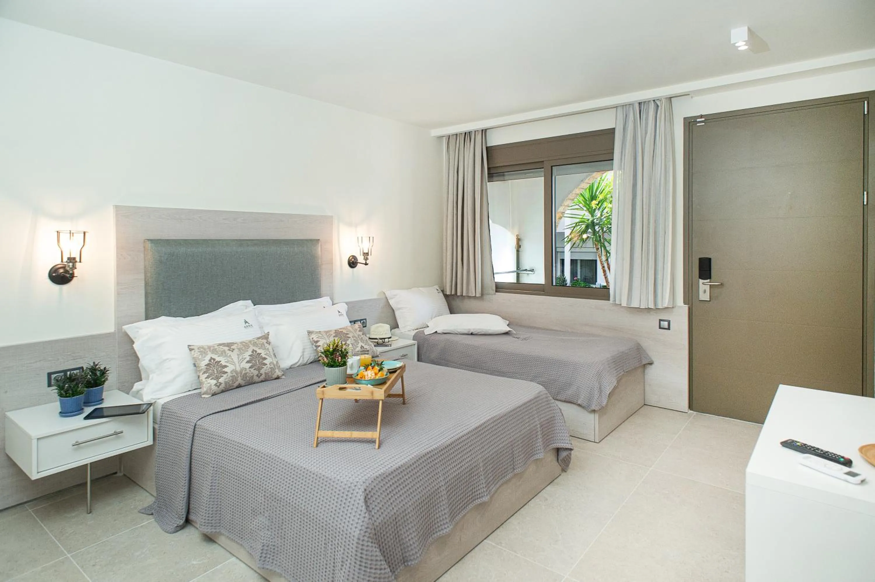 Bed in Anny's Residences & Suites