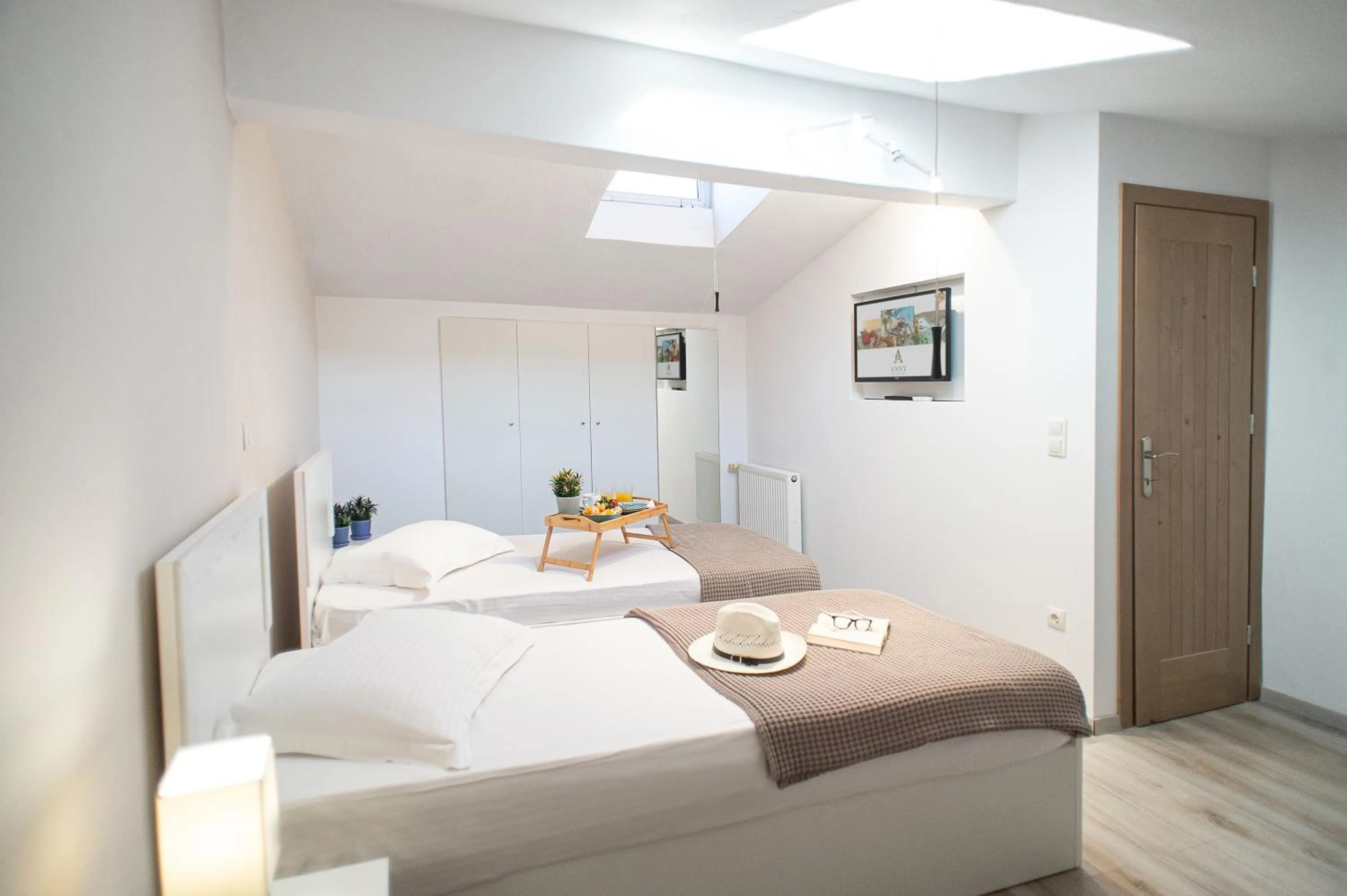 Bed in Anny's Residences & Suites