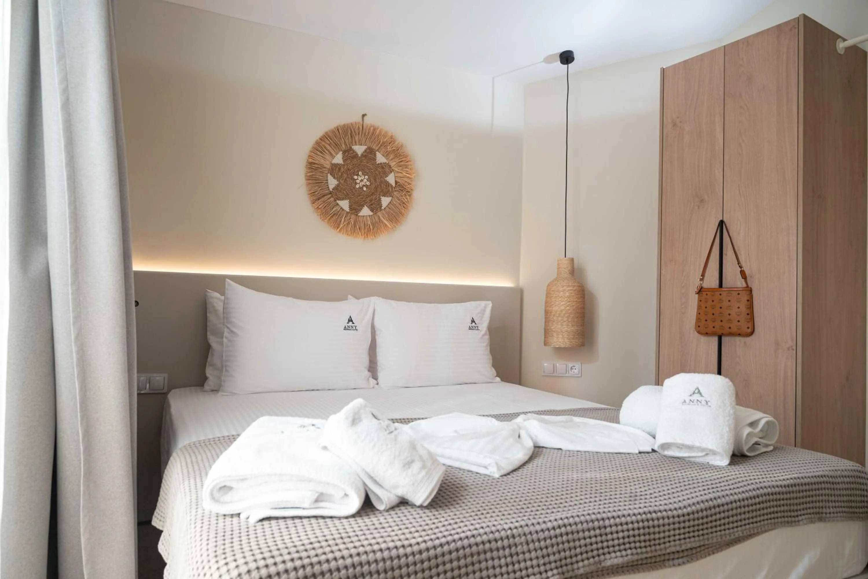 Bed in Anny's Residences & Suites